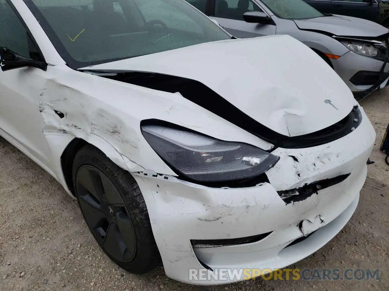 9 Photograph of a damaged car 5YJ3E1EA8MF077793 TESLA MODEL 3 2021