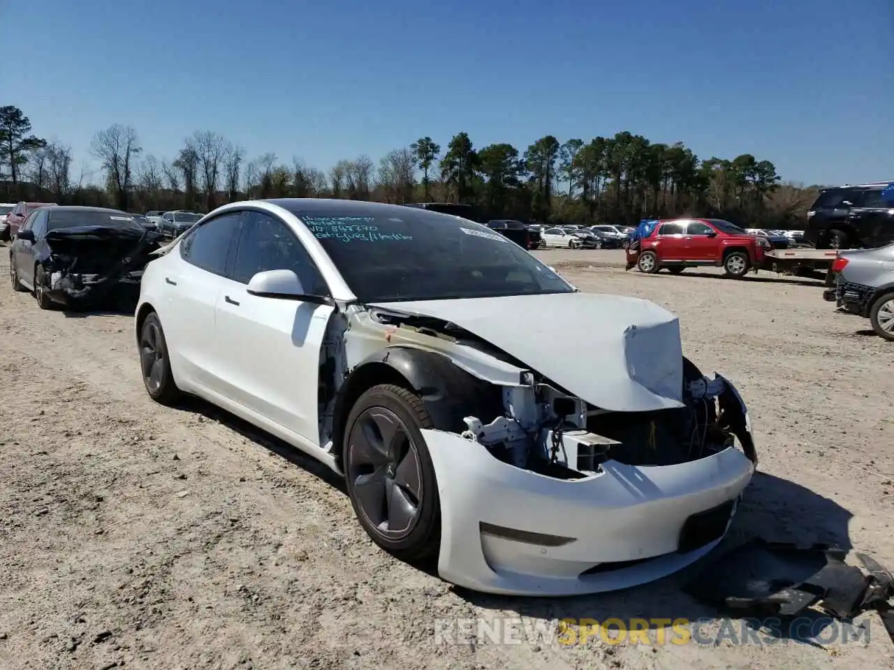 1 Photograph of a damaged car 5YJ3E1EA8MF848270 TESLA MODEL 3 2021