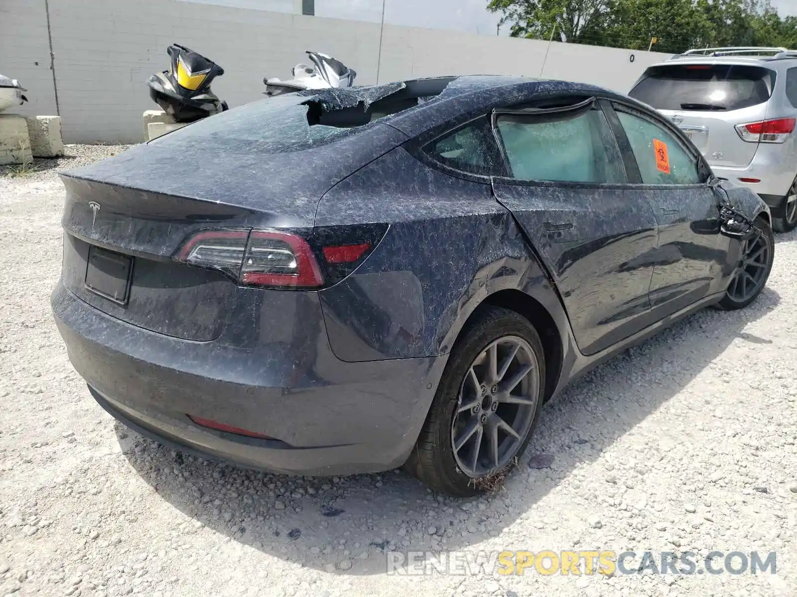 4 Photograph of a damaged car 5YJ3E1EA8MF854067 TESLA MODEL 3 2021