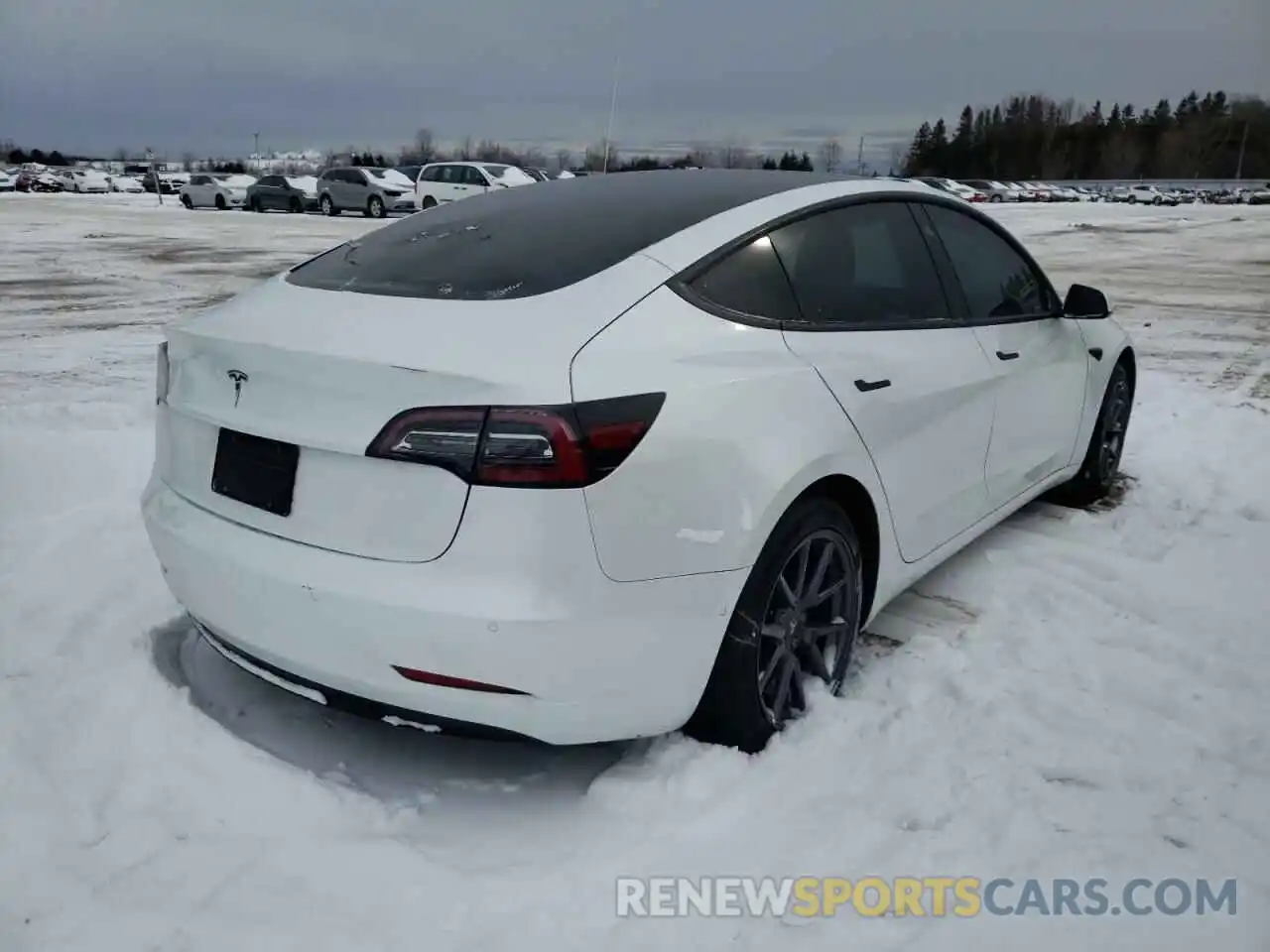 4 Photograph of a damaged car 5YJ3E1EA8MF856871 TESLA MODEL 3 2021