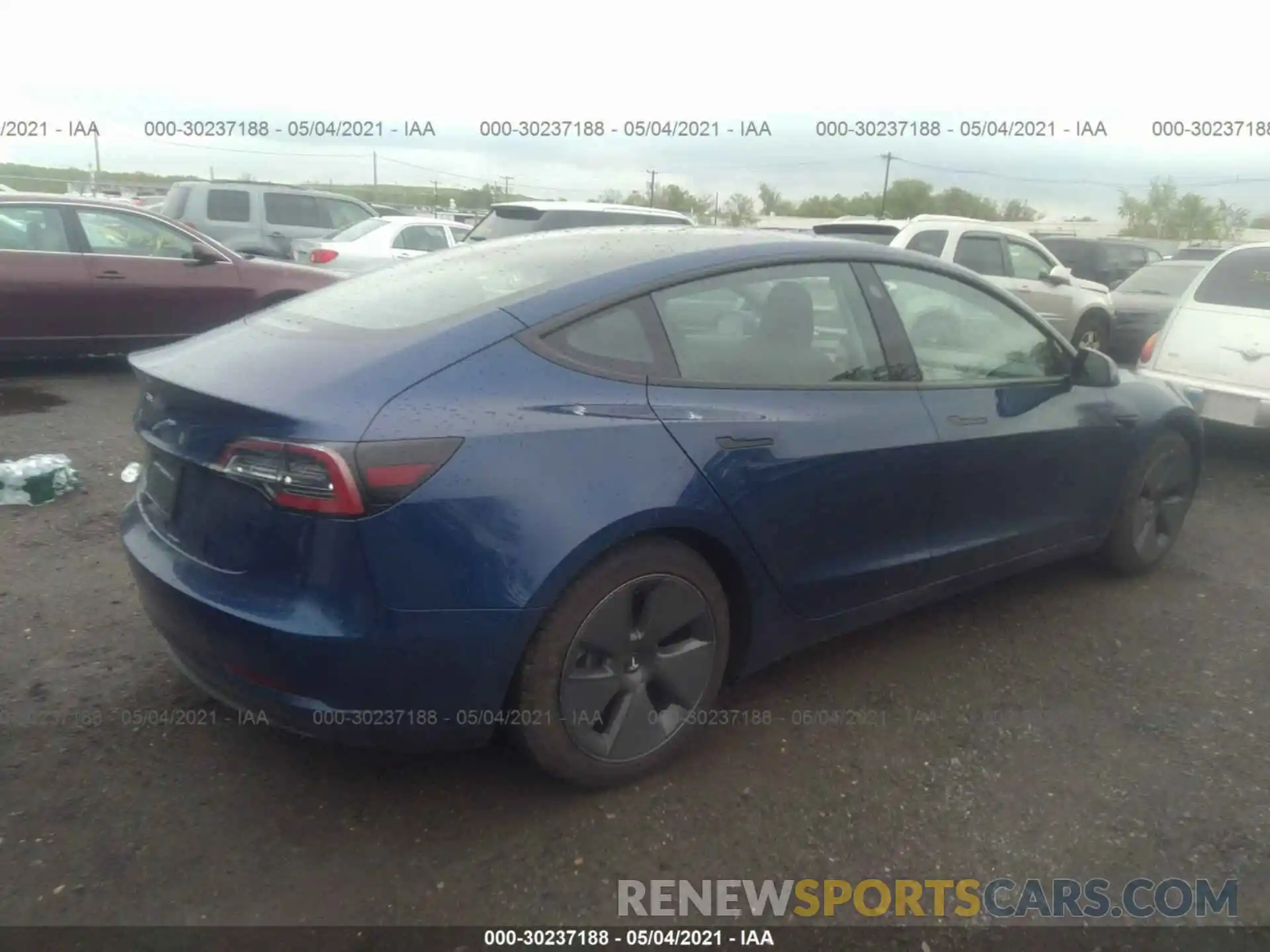 4 Photograph of a damaged car 5YJ3E1EA8MF859401 TESLA MODEL 3 2021