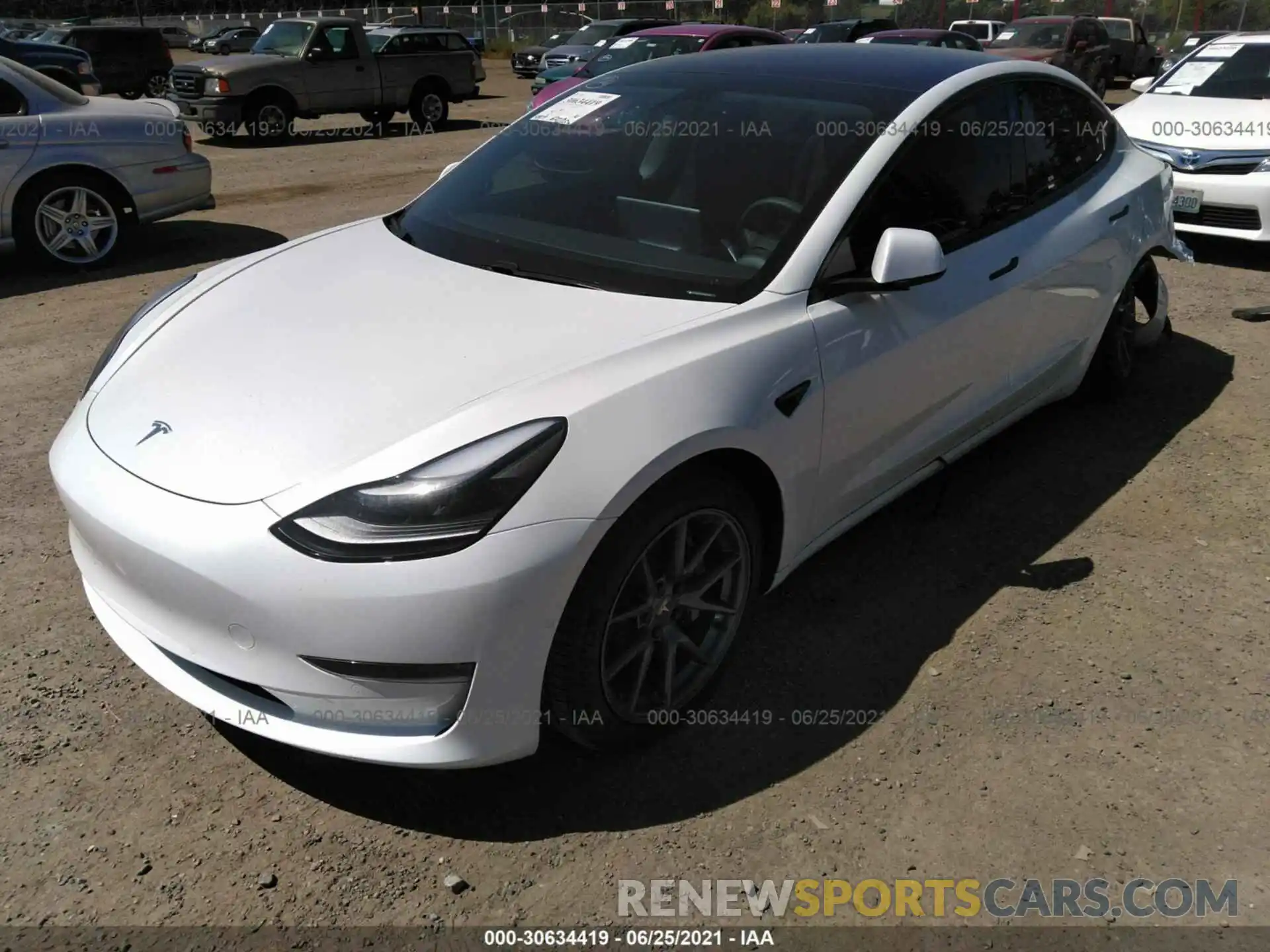 2 Photograph of a damaged car 5YJ3E1EA8MF867661 TESLA MODEL 3 2021