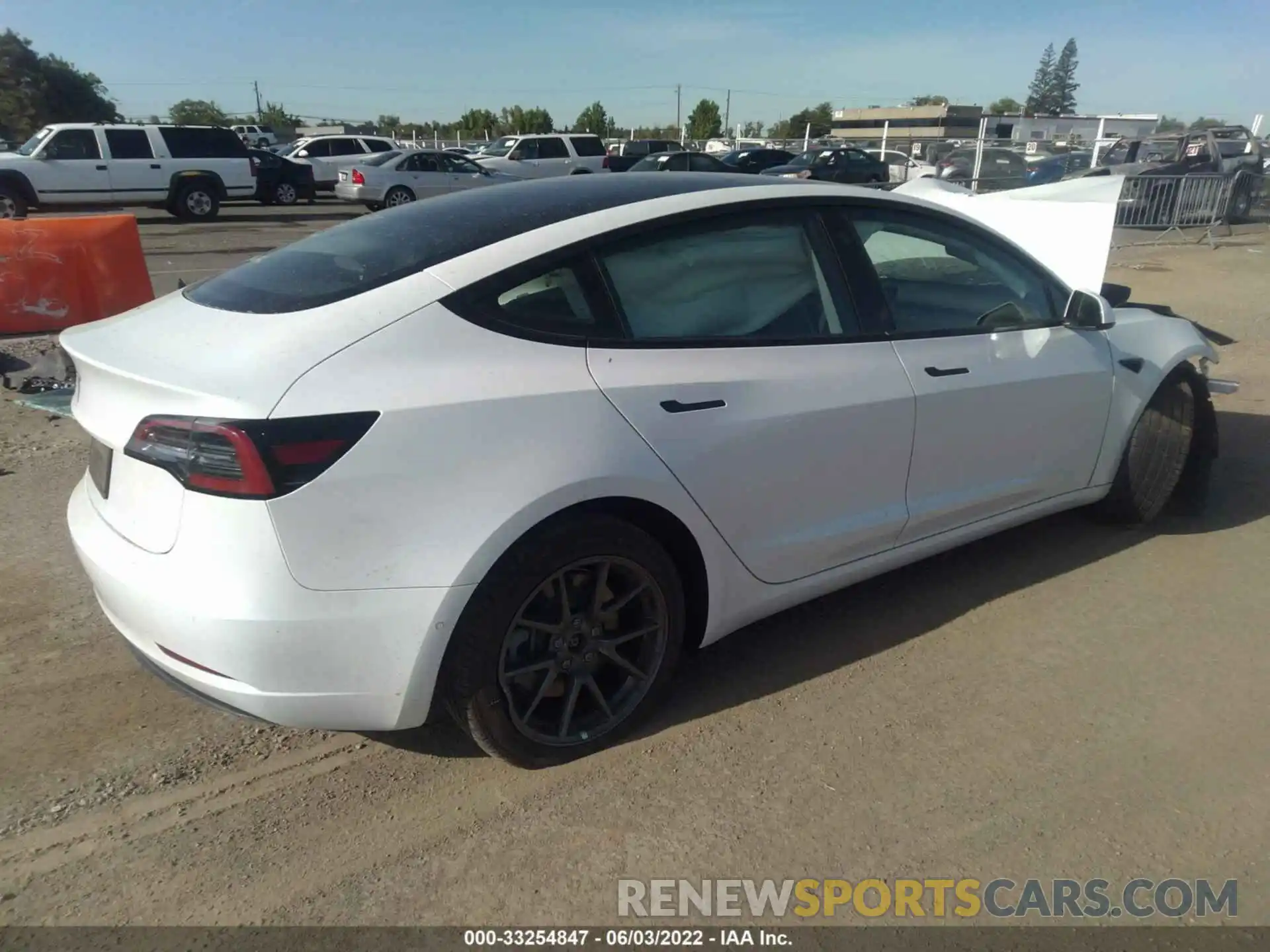 4 Photograph of a damaged car 5YJ3E1EA8MF874450 TESLA MODEL 3 2021