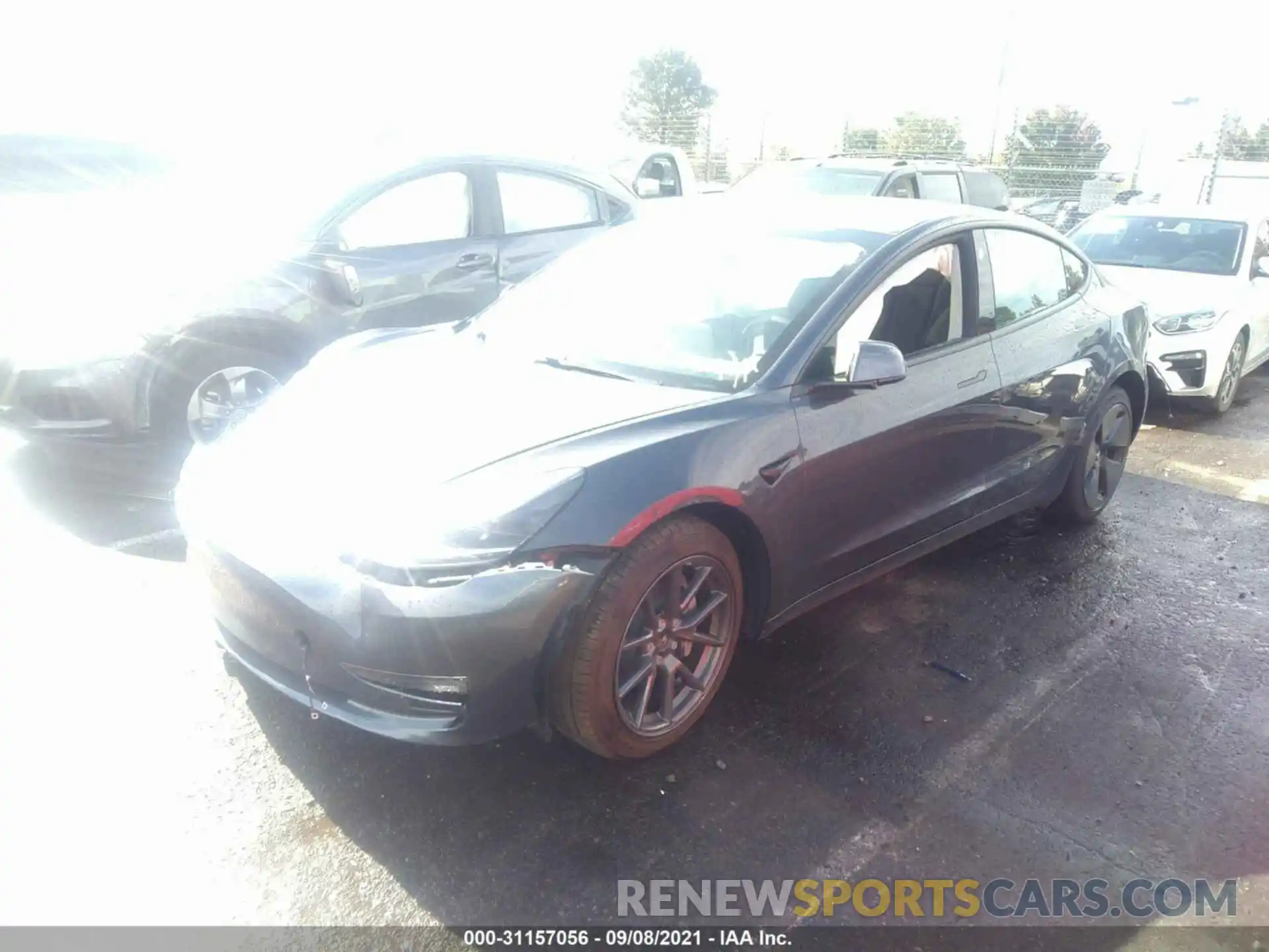 2 Photograph of a damaged car 5YJ3E1EA8MF906104 TESLA MODEL 3 2021