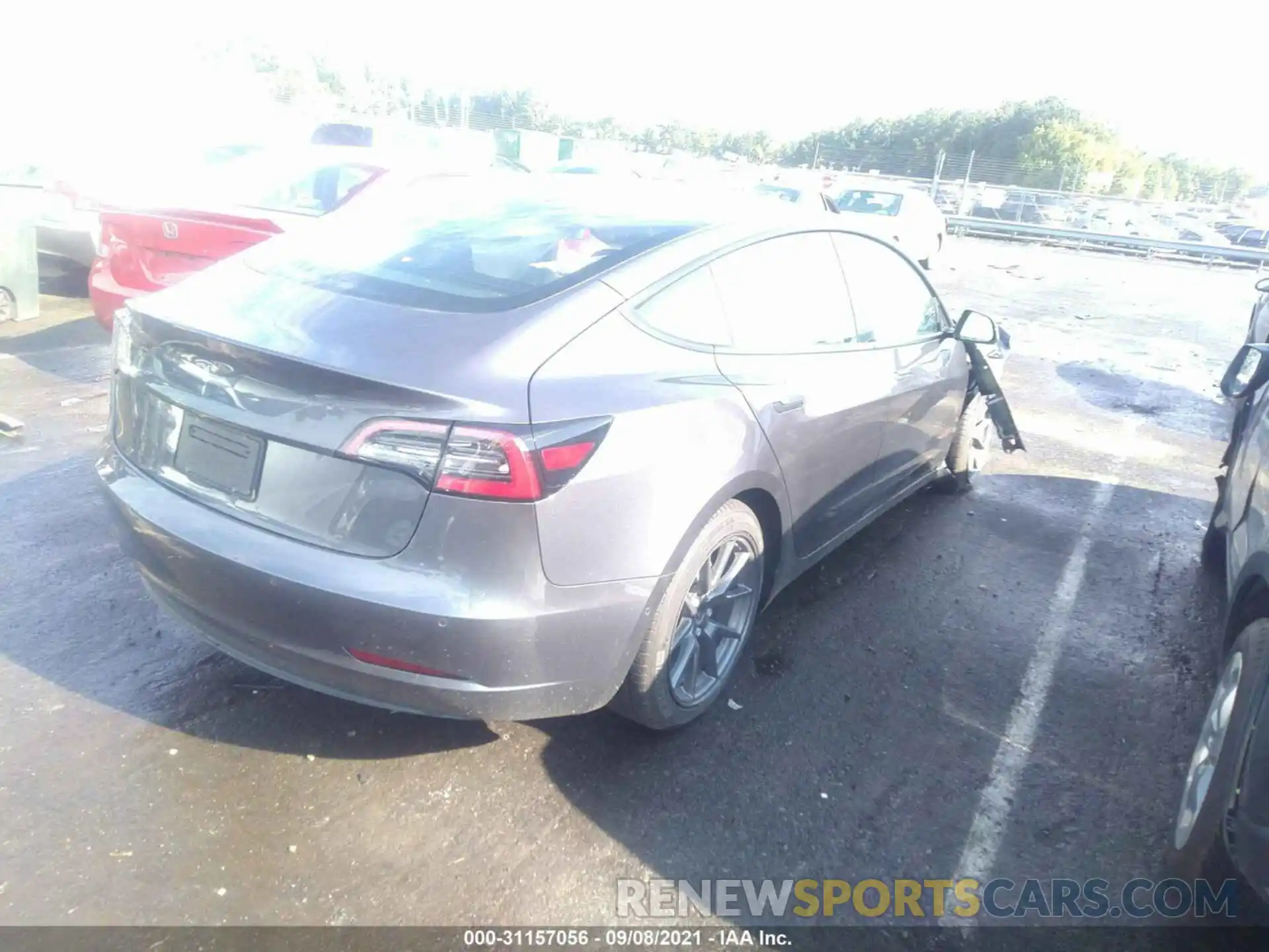 4 Photograph of a damaged car 5YJ3E1EA8MF906104 TESLA MODEL 3 2021