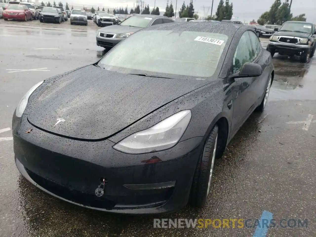 2 Photograph of a damaged car 5YJ3E1EA8MF908080 TESLA MODEL 3 2021