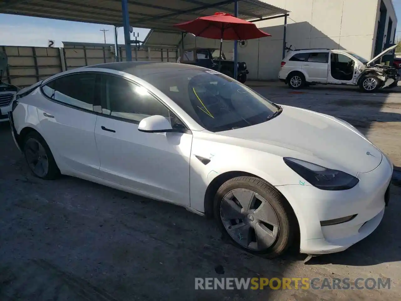 4 Photograph of a damaged car 5YJ3E1EA8MF911416 TESLA MODEL 3 2021