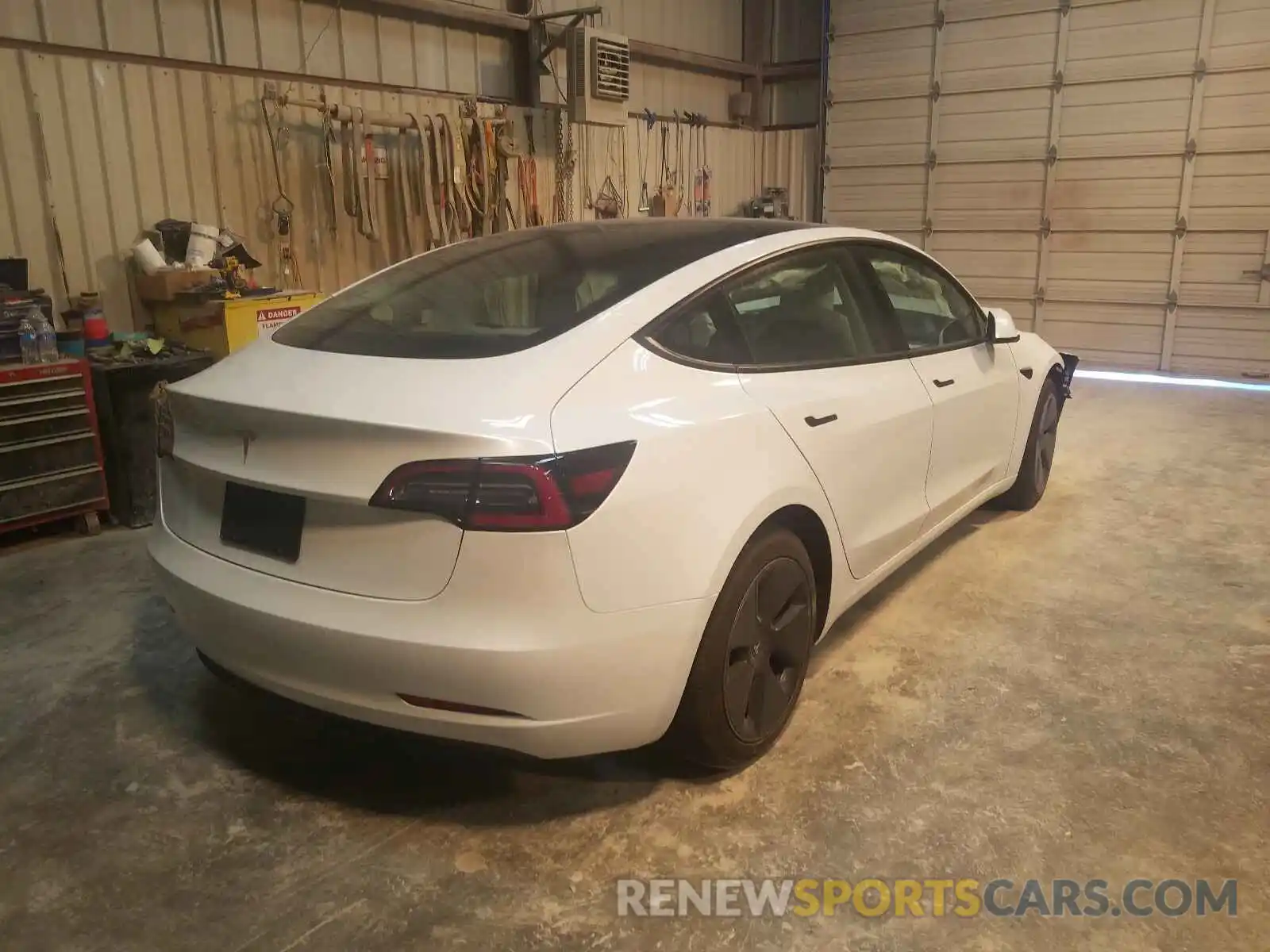 4 Photograph of a damaged car 5YJ3E1EA8MF917314 TESLA MODEL 3 2021