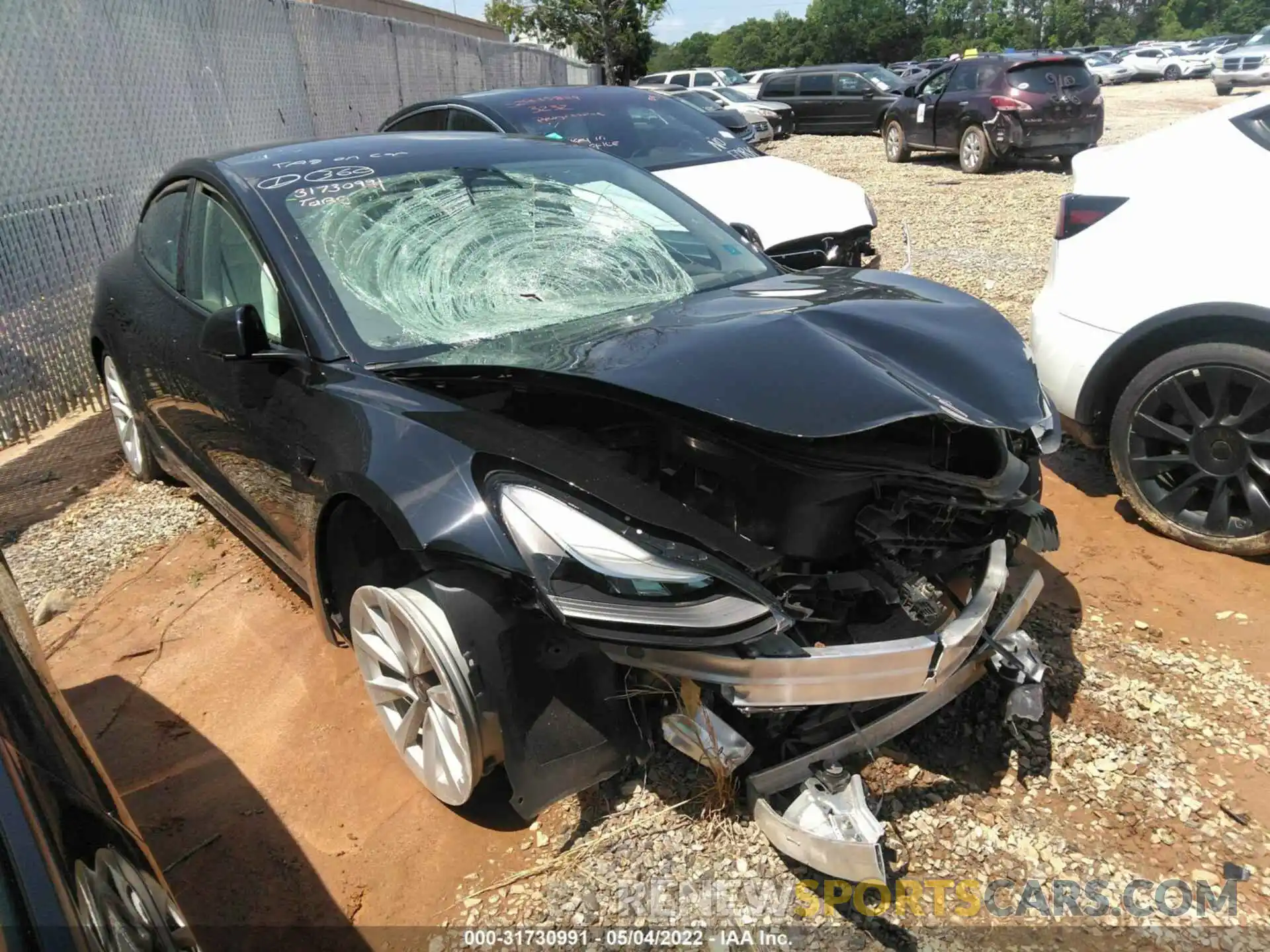 1 Photograph of a damaged car 5YJ3E1EA8MF921850 TESLA MODEL 3 2021