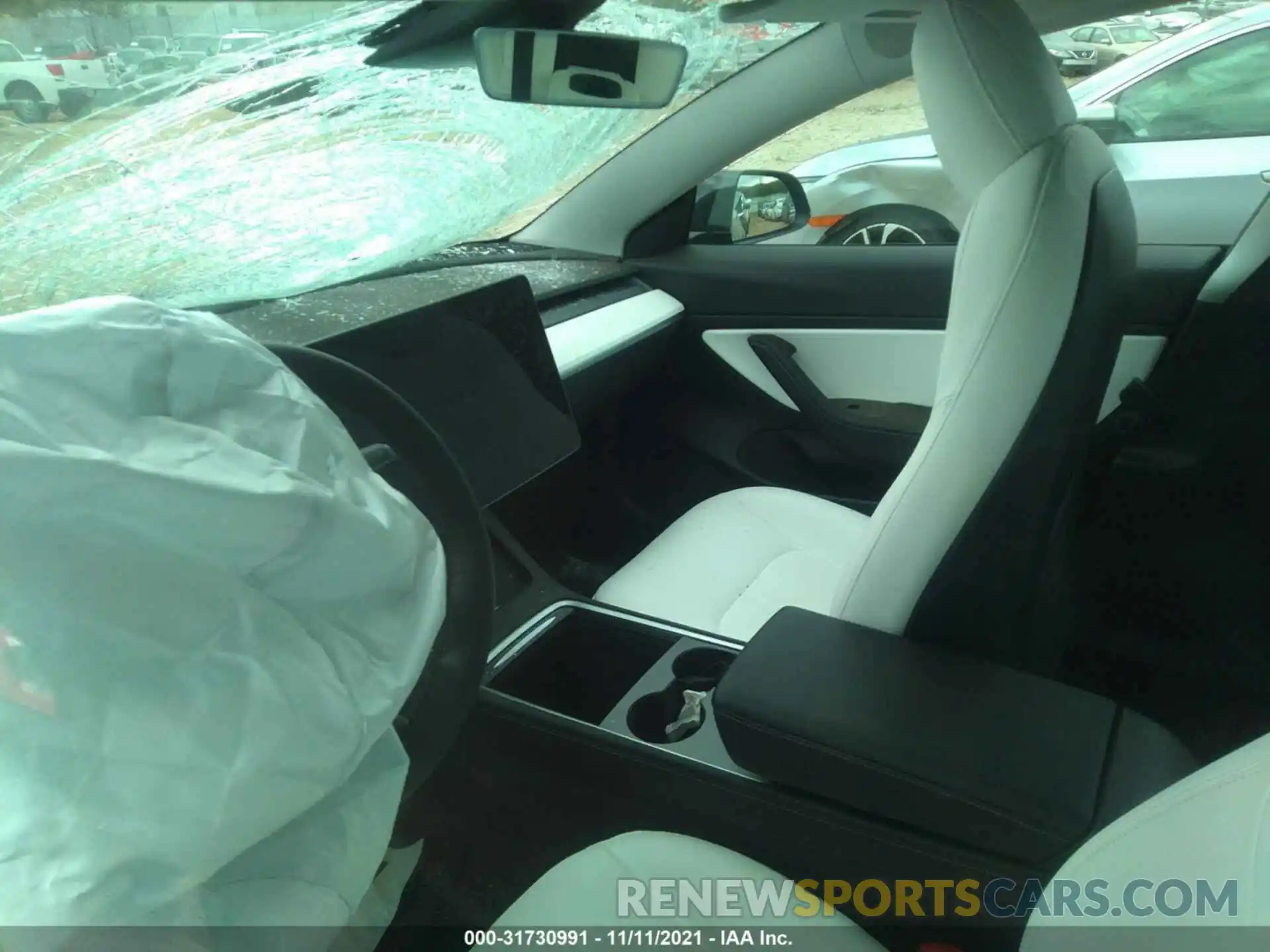 7 Photograph of a damaged car 5YJ3E1EA8MF921850 TESLA MODEL 3 2021