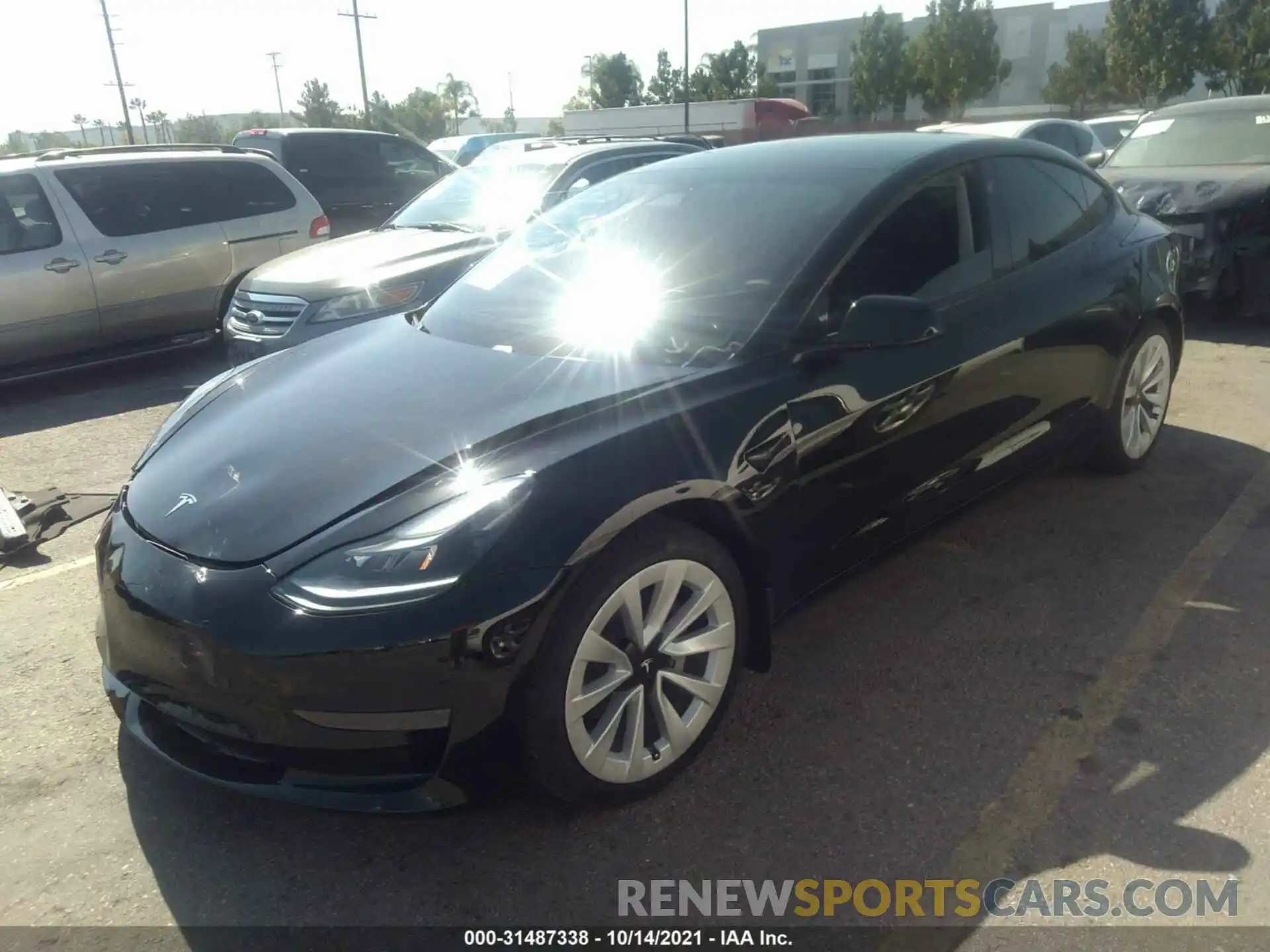 2 Photograph of a damaged car 5YJ3E1EA8MF922044 TESLA MODEL 3 2021