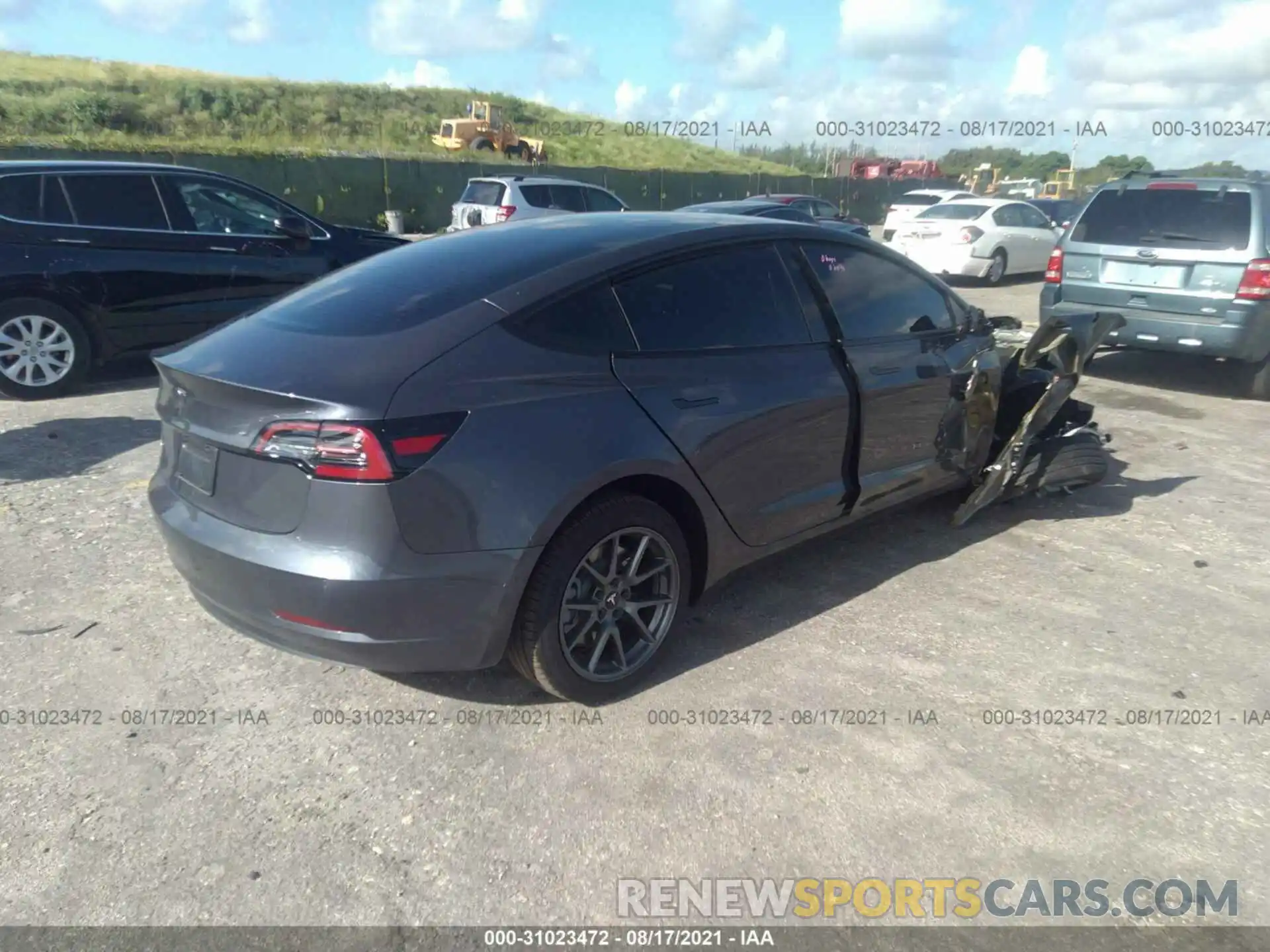 4 Photograph of a damaged car 5YJ3E1EA8MF955609 TESLA MODEL 3 2021