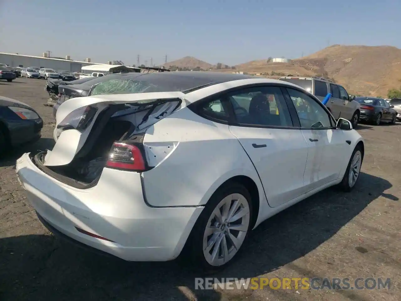 4 Photograph of a damaged car 5YJ3E1EA8MF982342 TESLA MODEL 3 2021