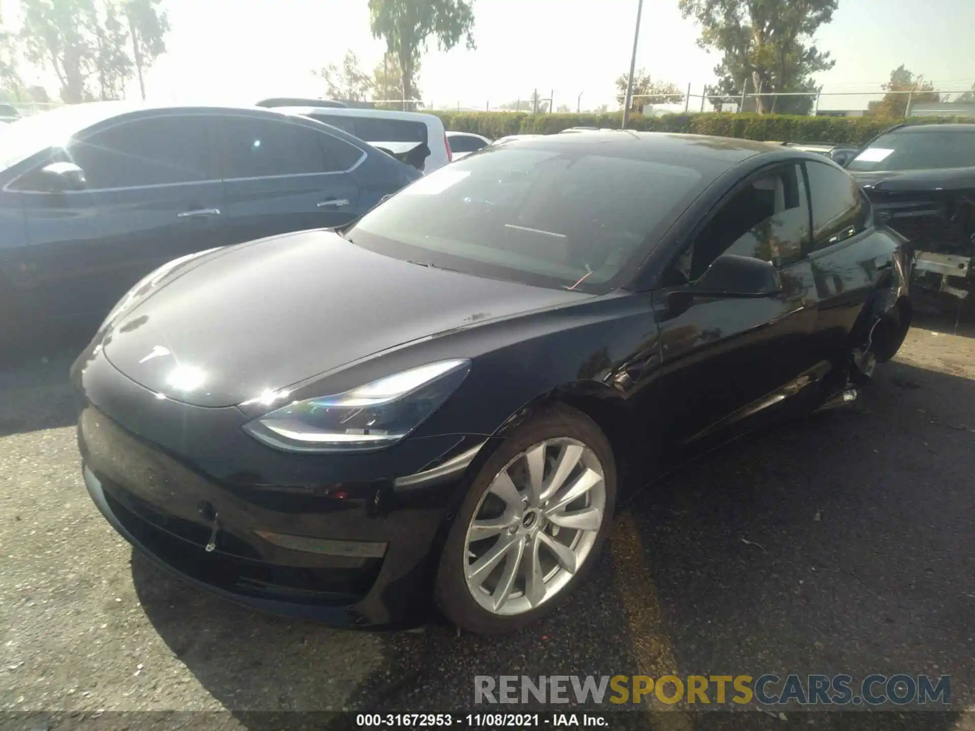 2 Photograph of a damaged car 5YJ3E1EA8MF982583 TESLA MODEL 3 2021