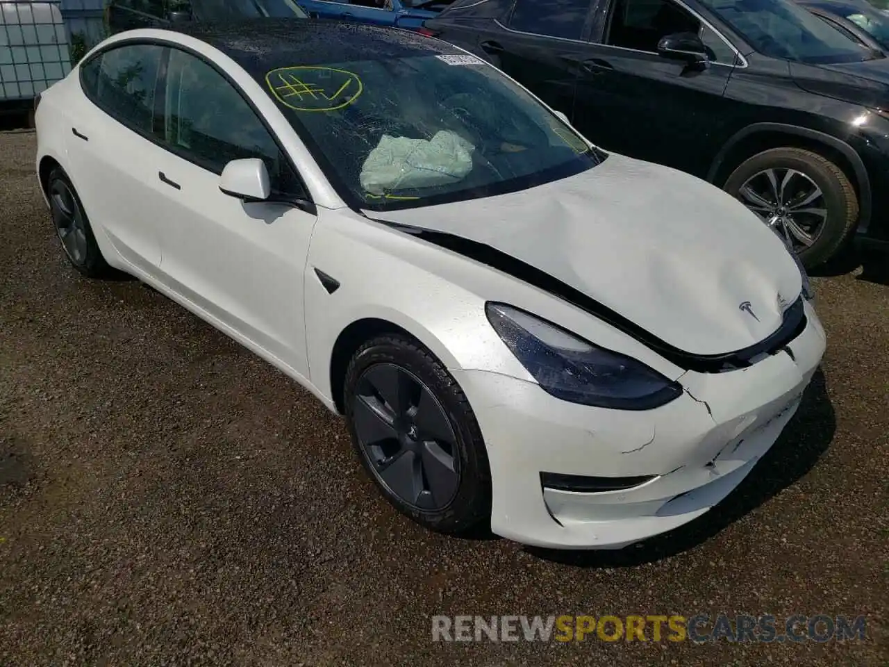 1 Photograph of a damaged car 5YJ3E1EA8MF986018 TESLA MODEL 3 2021