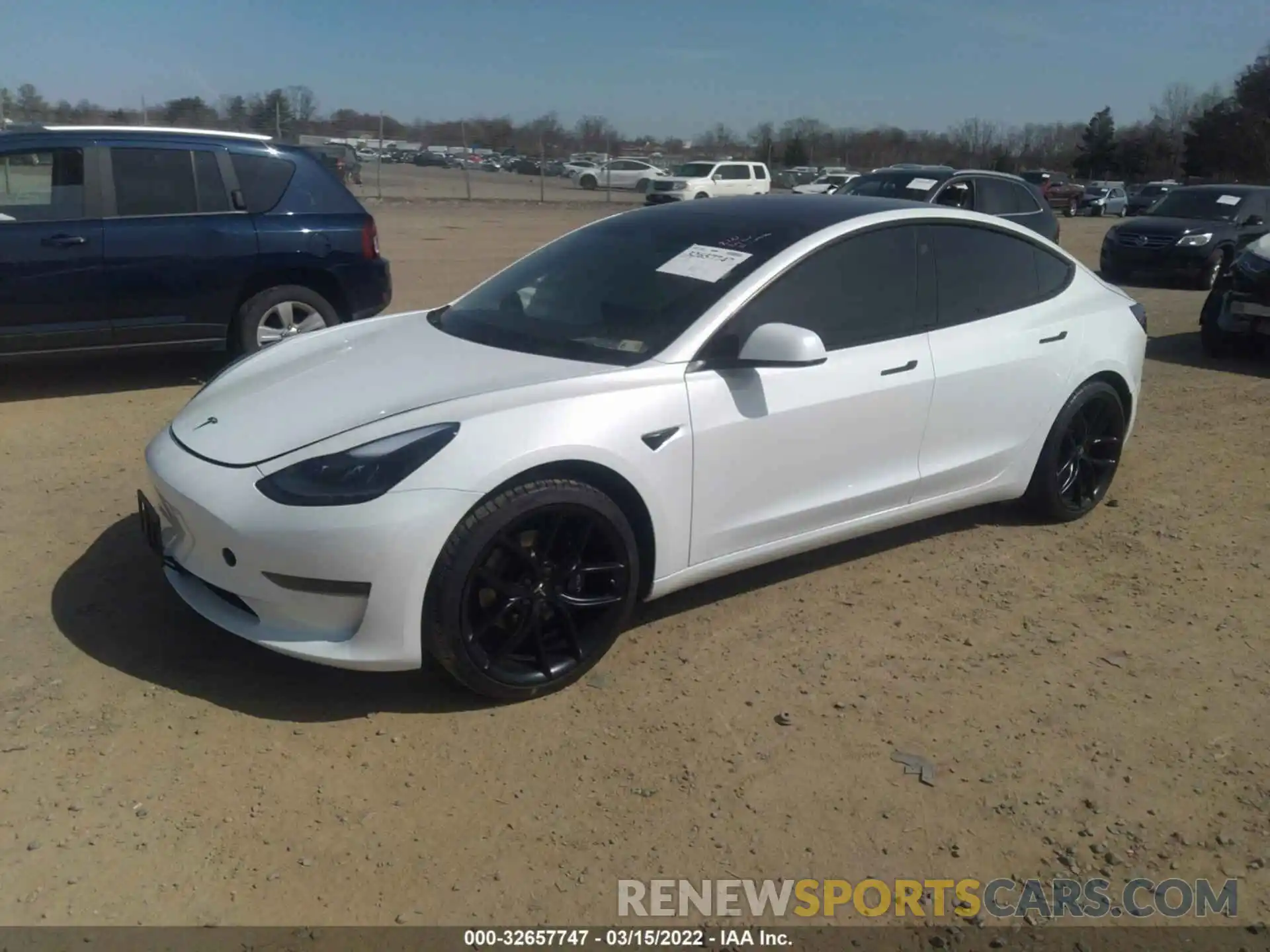 2 Photograph of a damaged car 5YJ3E1EA8MF989761 TESLA MODEL 3 2021