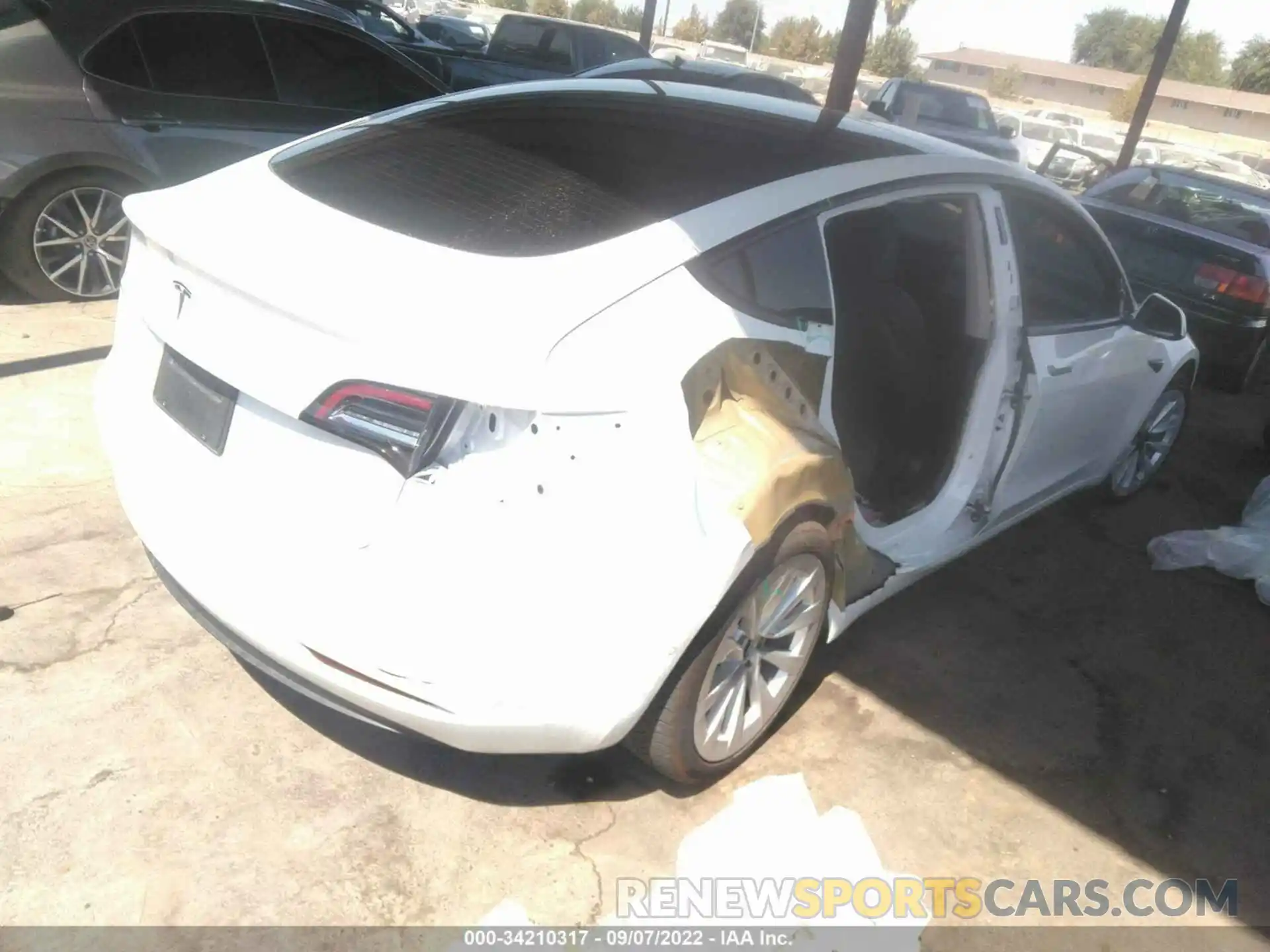 4 Photograph of a damaged car 5YJ3E1EA9MF018218 TESLA MODEL 3 2021