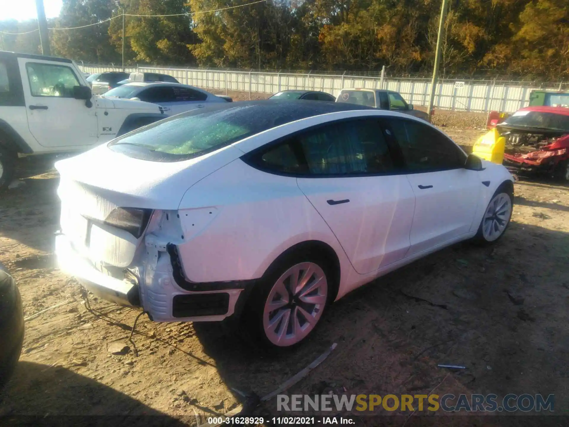 4 Photograph of a damaged car 5YJ3E1EA9MF019210 TESLA MODEL 3 2021