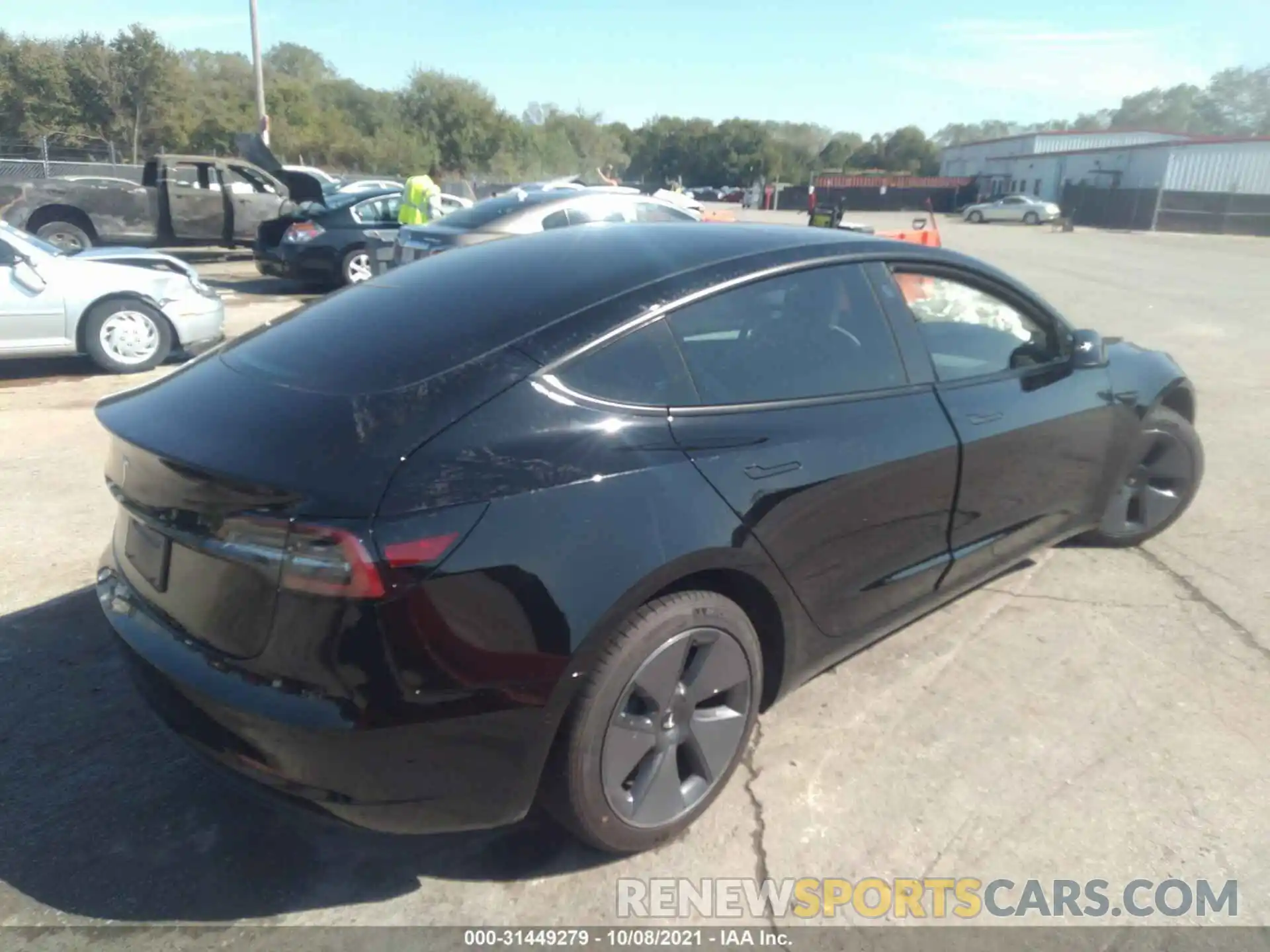 4 Photograph of a damaged car 5YJ3E1EA9MF030661 TESLA MODEL 3 2021