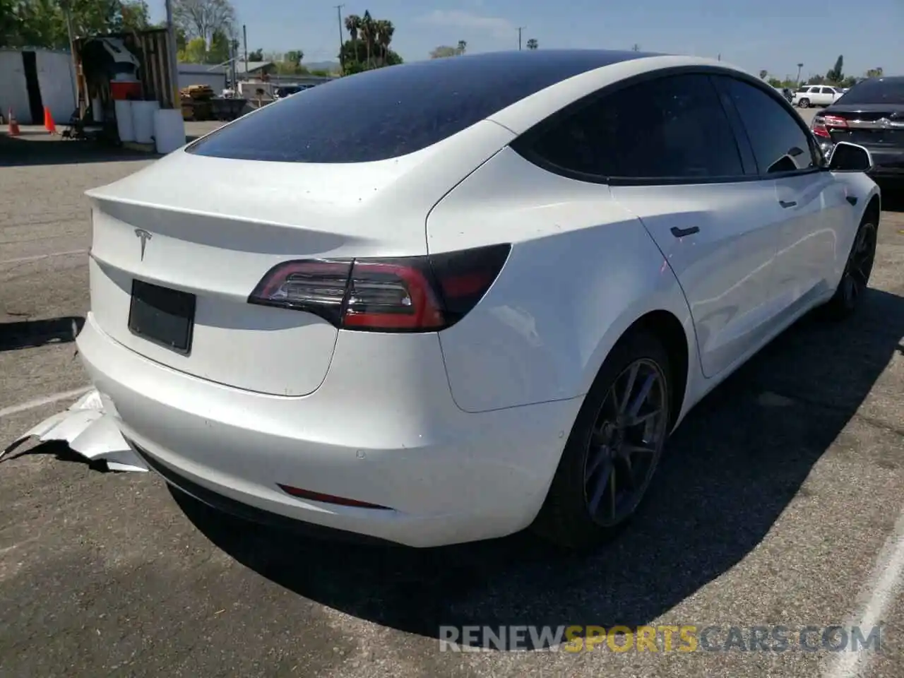 4 Photograph of a damaged car 5YJ3E1EA9MF052689 TESLA MODEL 3 2021