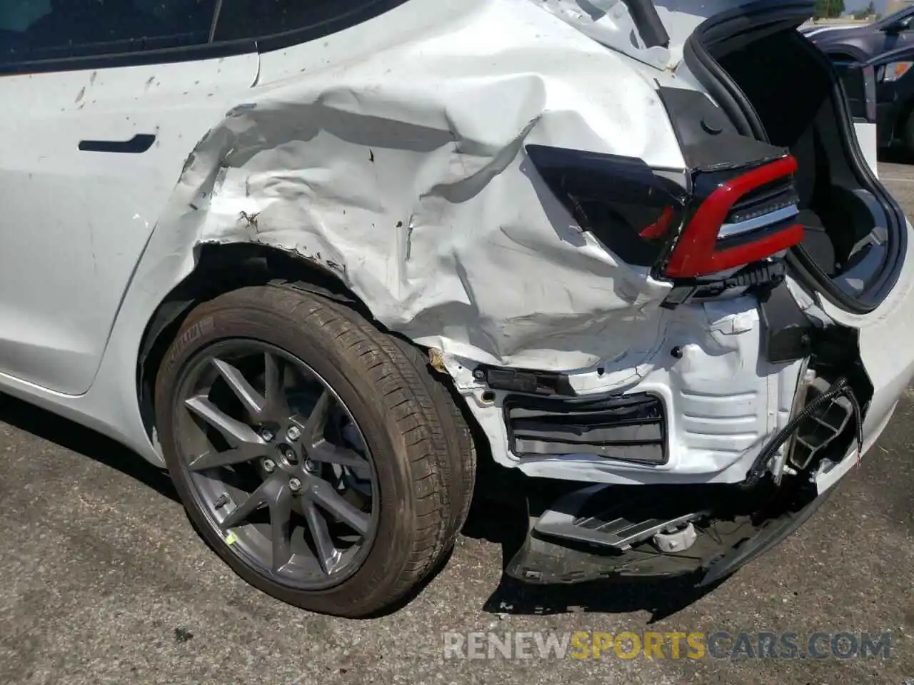 9 Photograph of a damaged car 5YJ3E1EA9MF052689 TESLA MODEL 3 2021