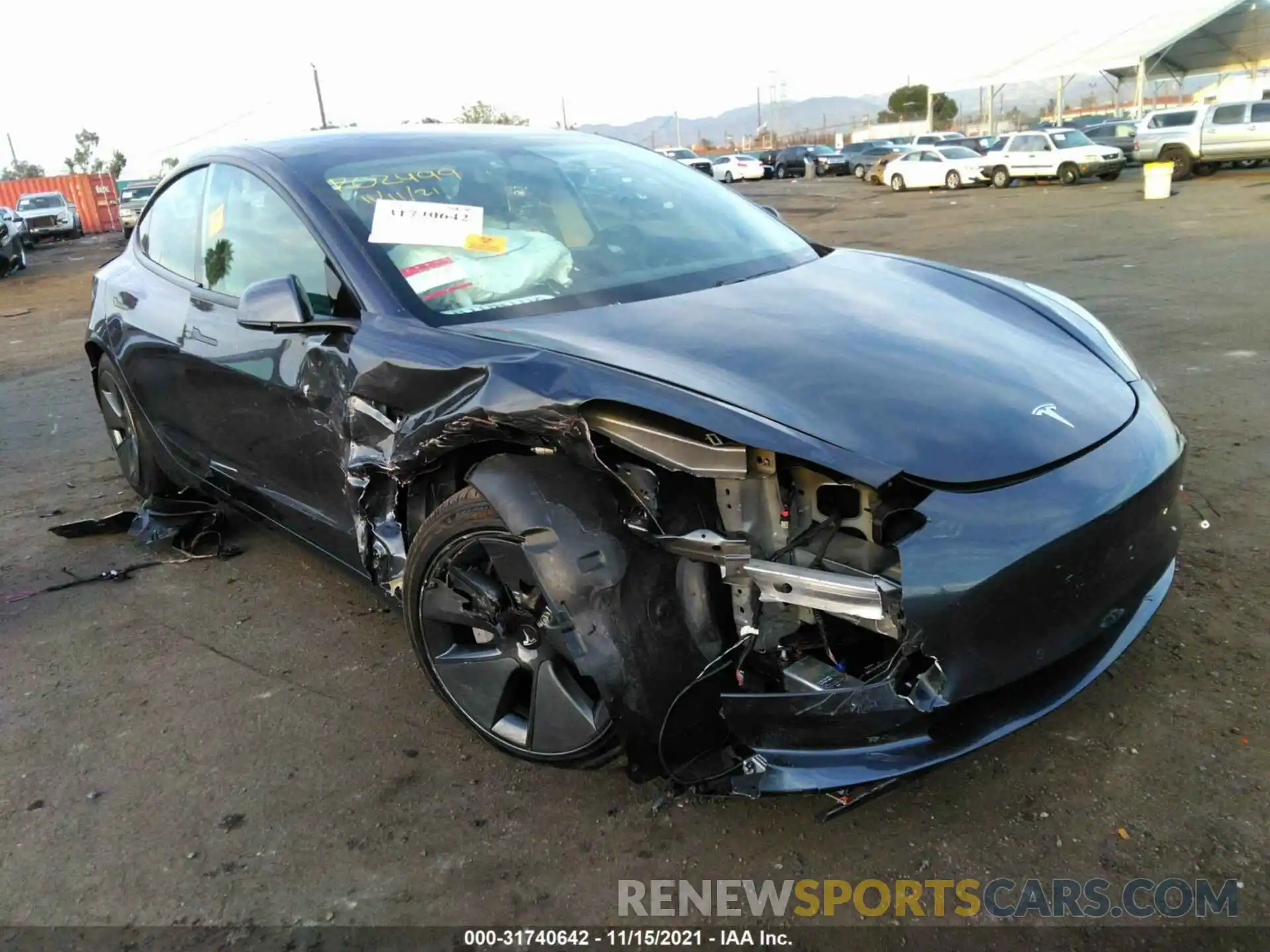 1 Photograph of a damaged car 5YJ3E1EA9MF067001 TESLA MODEL 3 2021