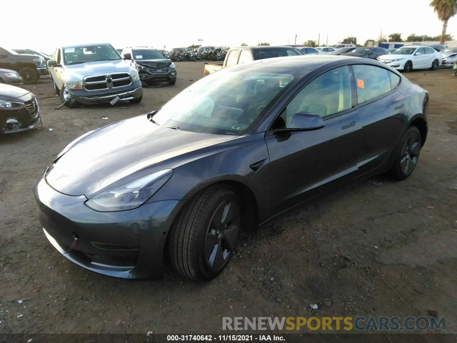 2 Photograph of a damaged car 5YJ3E1EA9MF067001 TESLA MODEL 3 2021