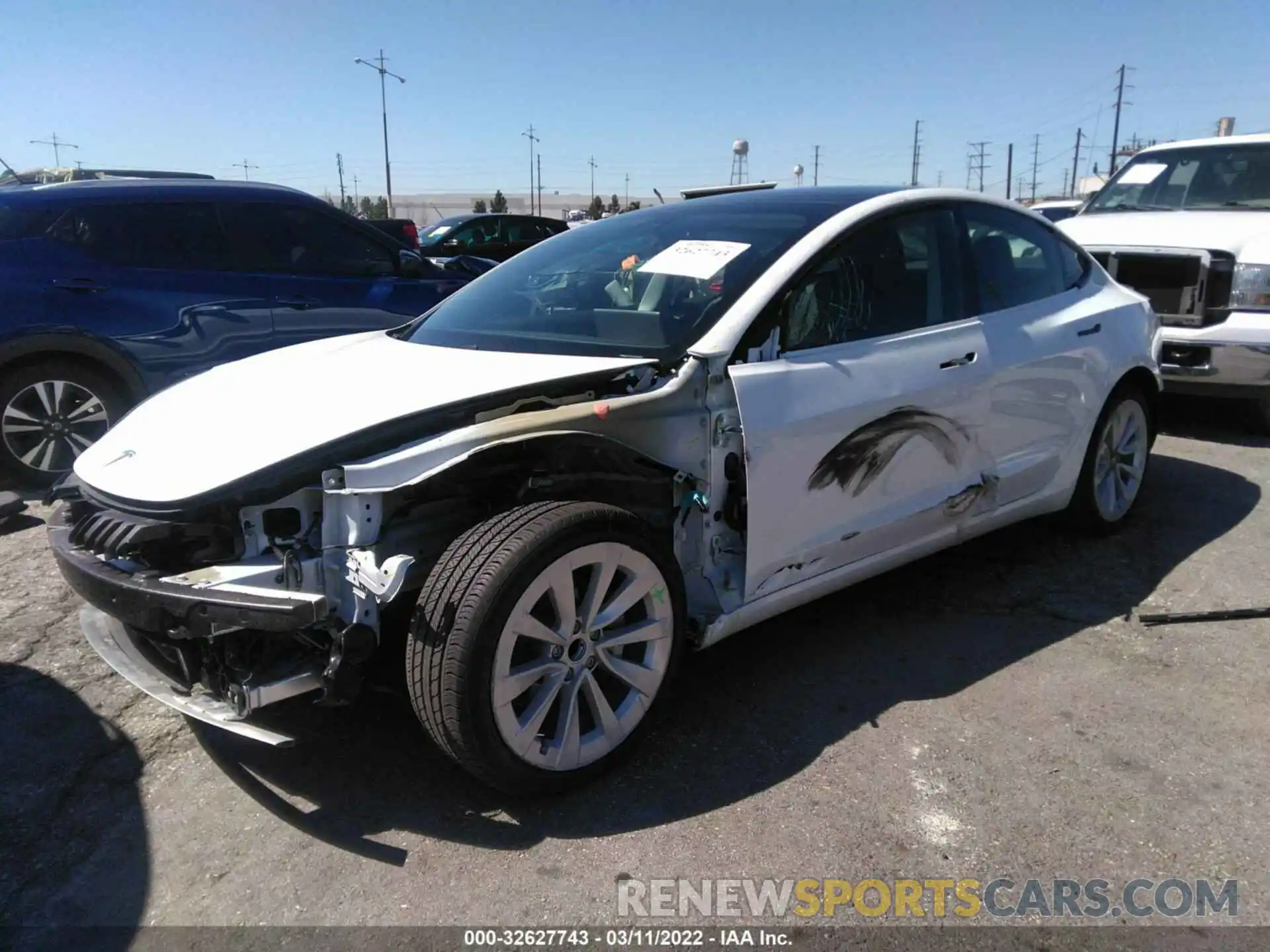 2 Photograph of a damaged car 5YJ3E1EA9MF069038 TESLA MODEL 3 2021