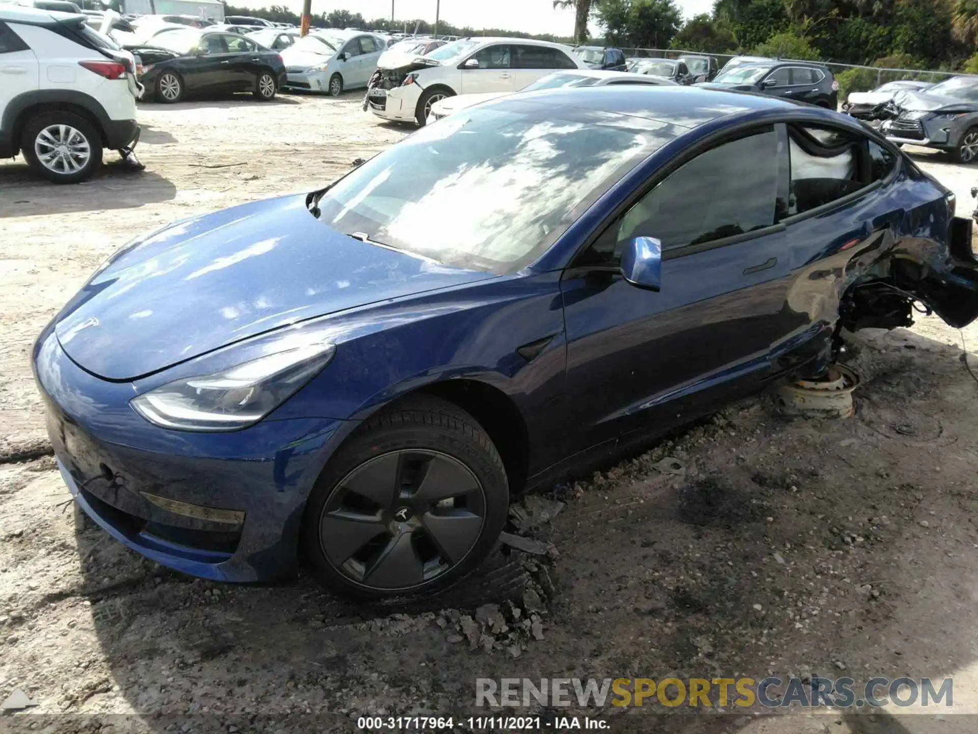 2 Photograph of a damaged car 5YJ3E1EA9MF077401 TESLA MODEL 3 2021