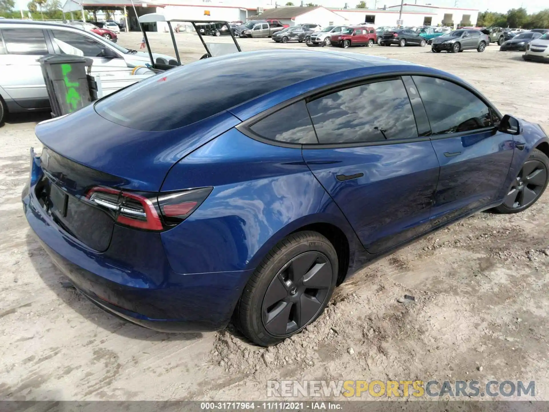 4 Photograph of a damaged car 5YJ3E1EA9MF077401 TESLA MODEL 3 2021