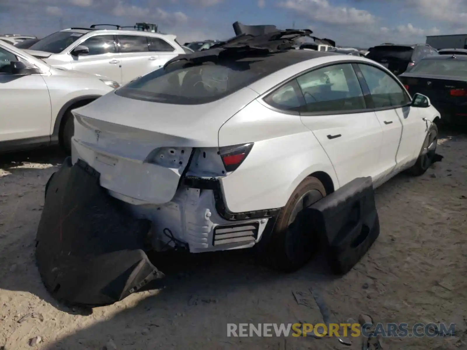 4 Photograph of a damaged car 5YJ3E1EA9MF837097 TESLA MODEL 3 2021