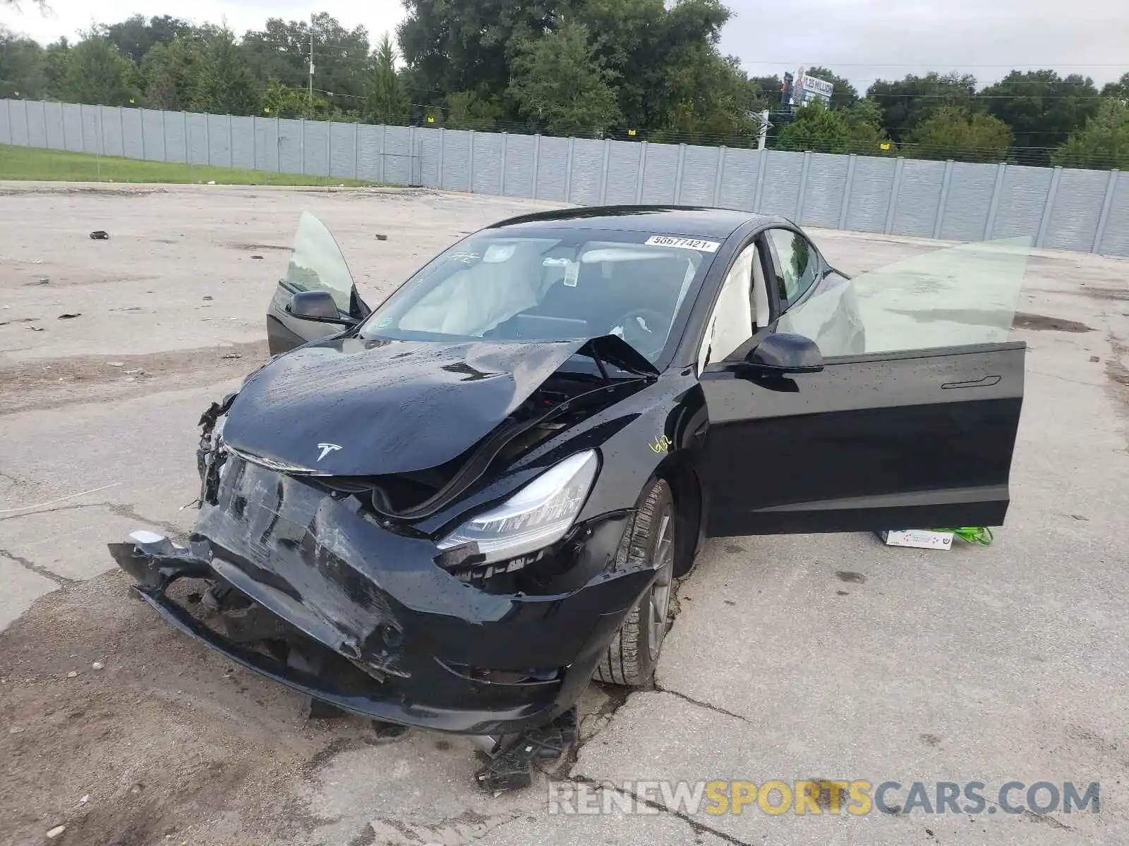 2 Photograph of a damaged car 5YJ3E1EA9MF860461 TESLA MODEL 3 2021