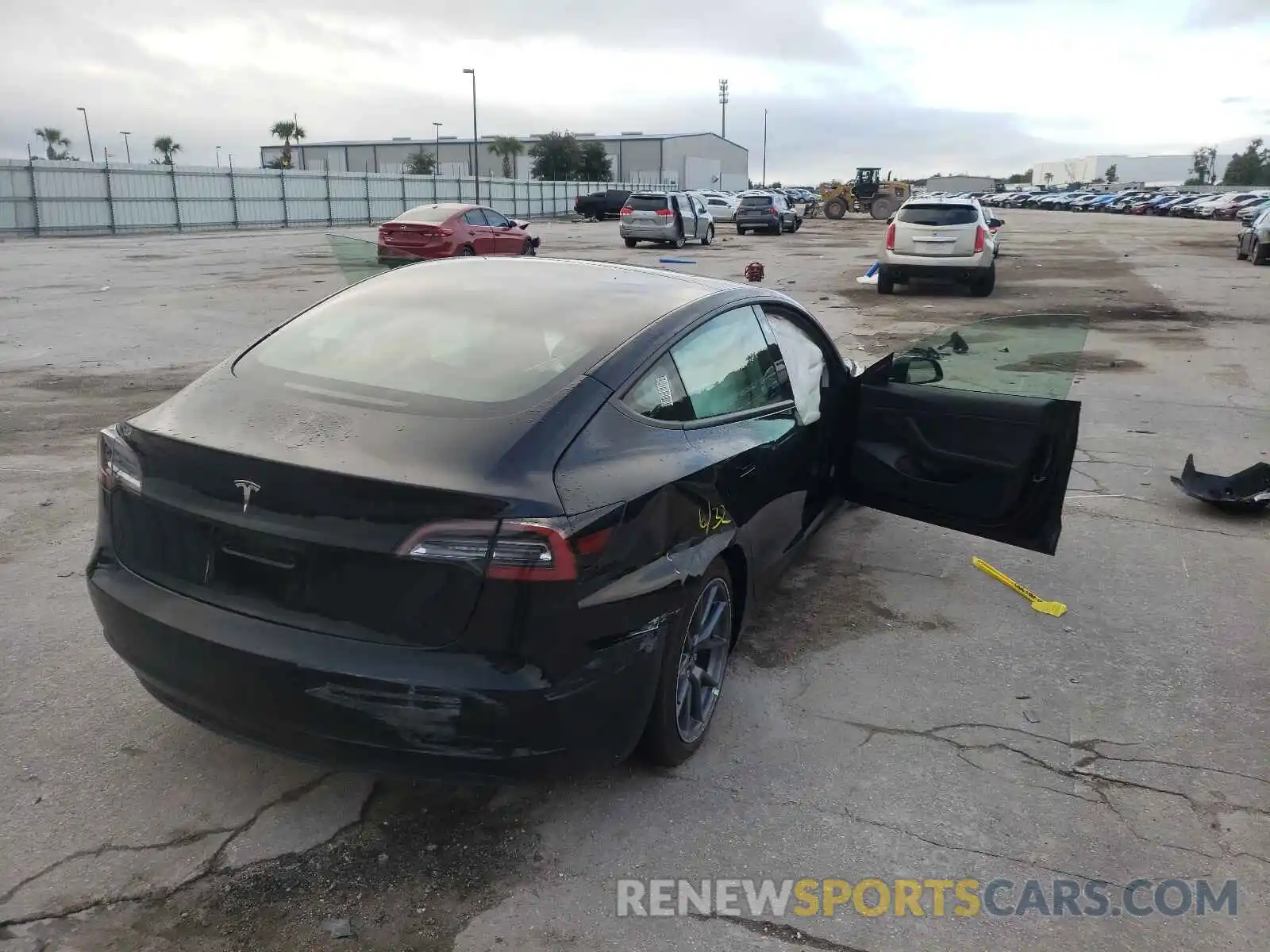 4 Photograph of a damaged car 5YJ3E1EA9MF860461 TESLA MODEL 3 2021