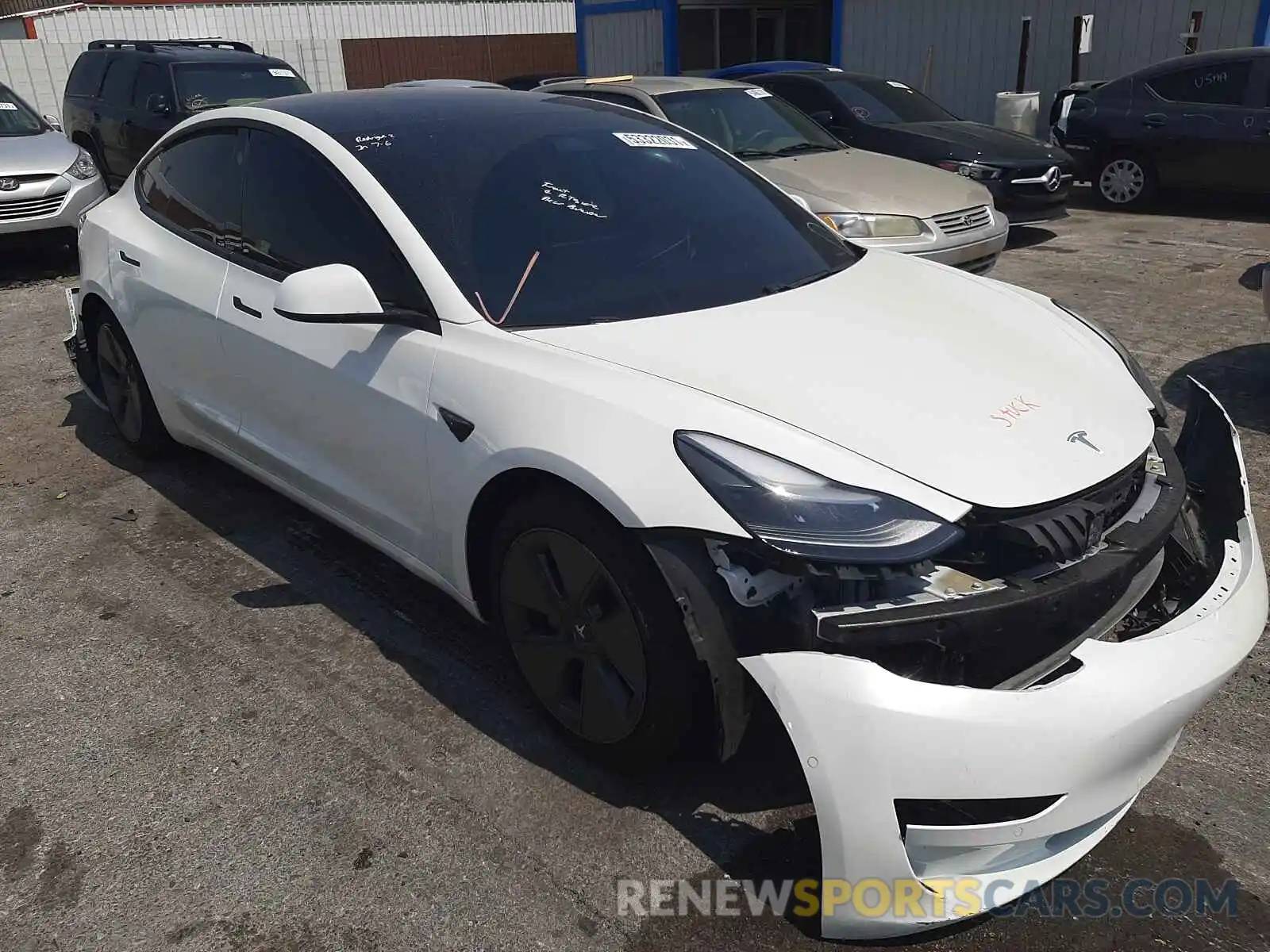 1 Photograph of a damaged car 5YJ3E1EA9MF867801 TESLA MODEL 3 2021