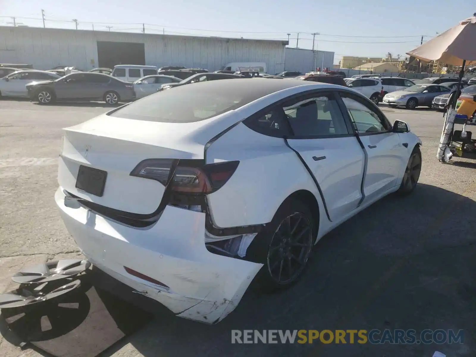 4 Photograph of a damaged car 5YJ3E1EA9MF868088 TESLA MODEL 3 2021