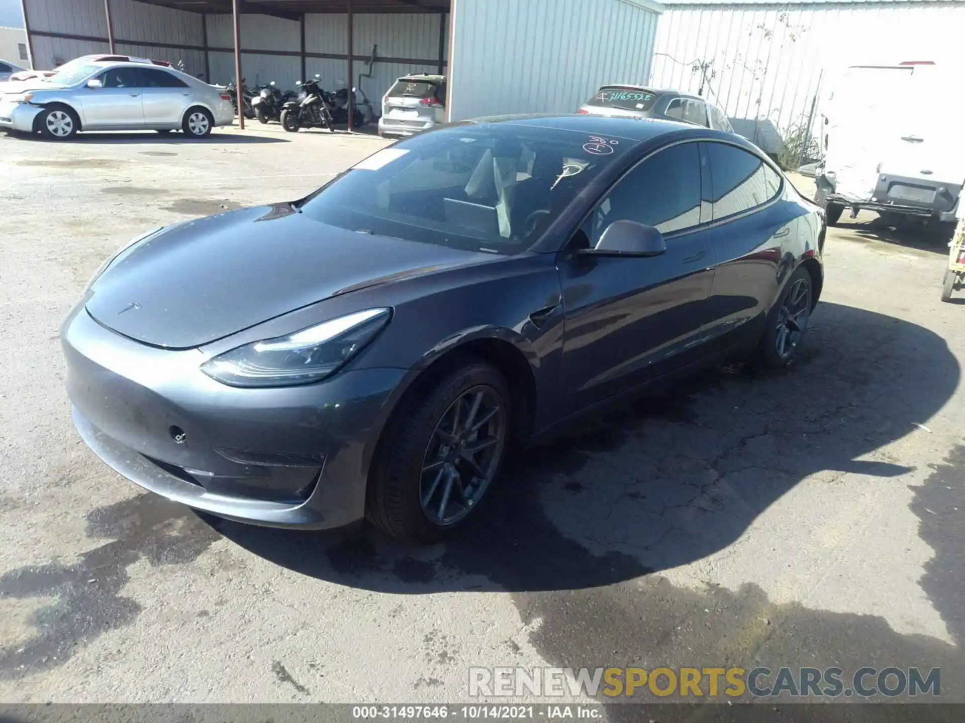 2 Photograph of a damaged car 5YJ3E1EA9MF873100 TESLA MODEL 3 2021