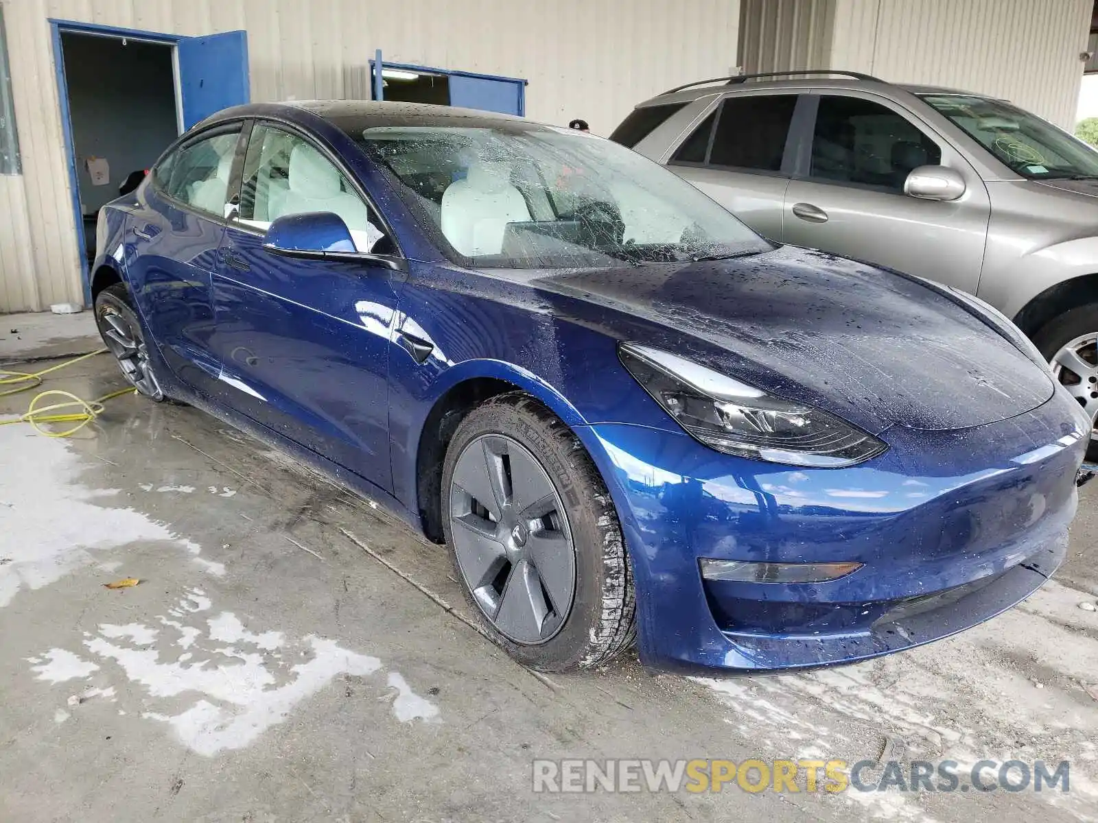 1 Photograph of a damaged car 5YJ3E1EA9MF908475 TESLA MODEL 3 2021