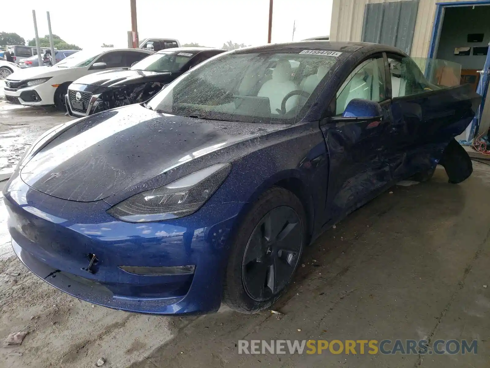 2 Photograph of a damaged car 5YJ3E1EA9MF908475 TESLA MODEL 3 2021