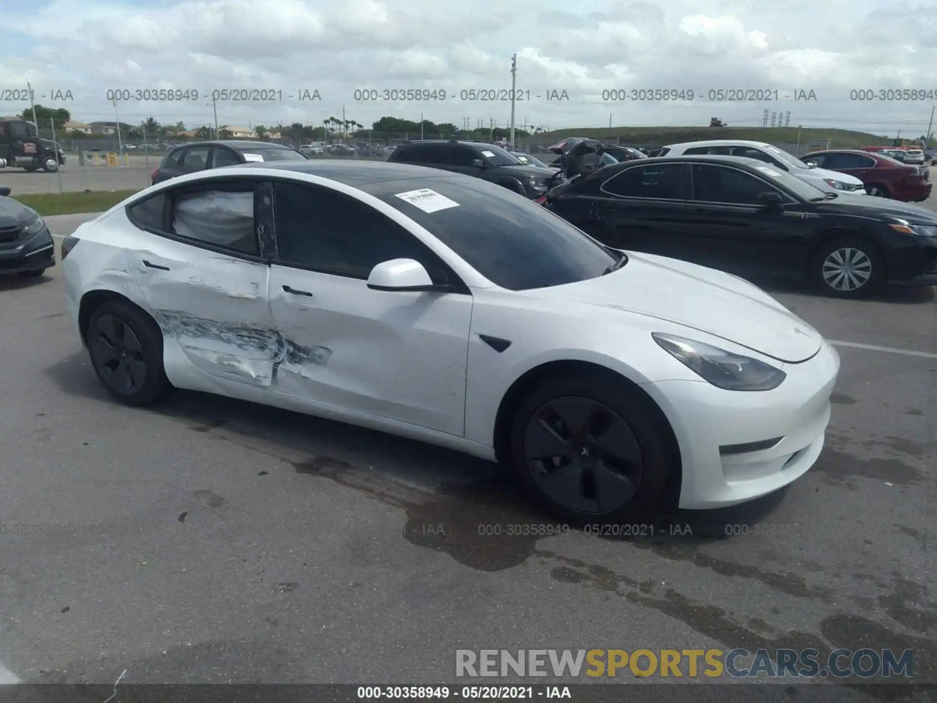 1 Photograph of a damaged car 5YJ3E1EA9MF908685 TESLA MODEL 3 2021