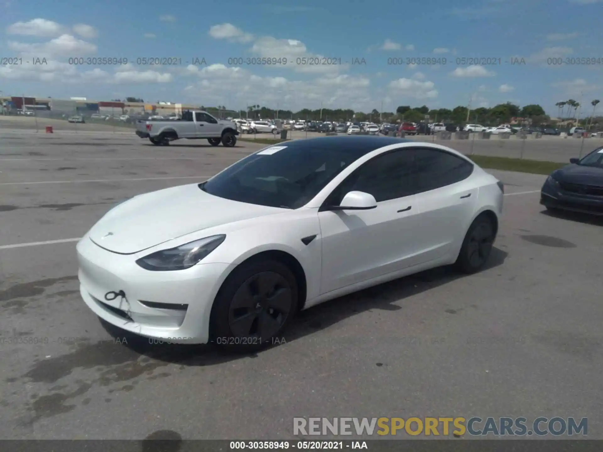 2 Photograph of a damaged car 5YJ3E1EA9MF908685 TESLA MODEL 3 2021