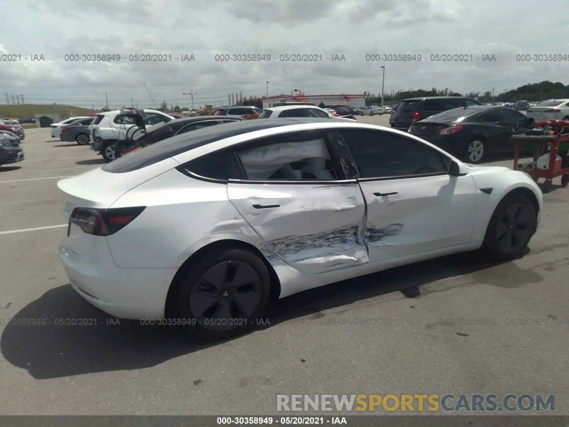 6 Photograph of a damaged car 5YJ3E1EA9MF908685 TESLA MODEL 3 2021