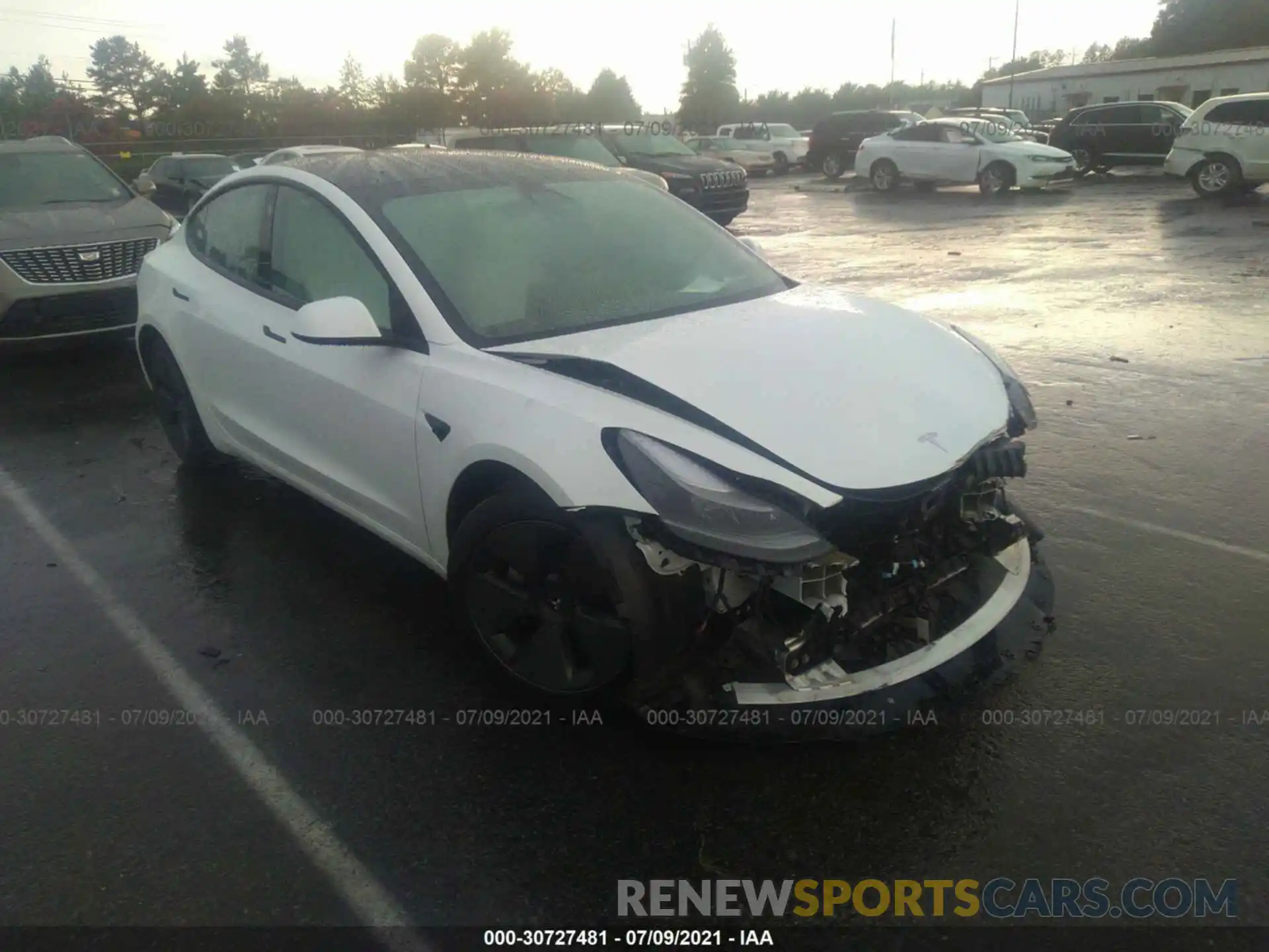 1 Photograph of a damaged car 5YJ3E1EA9MF915815 TESLA MODEL 3 2021