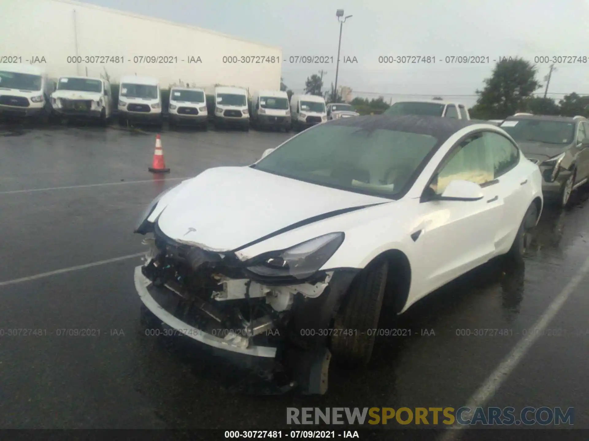 2 Photograph of a damaged car 5YJ3E1EA9MF915815 TESLA MODEL 3 2021