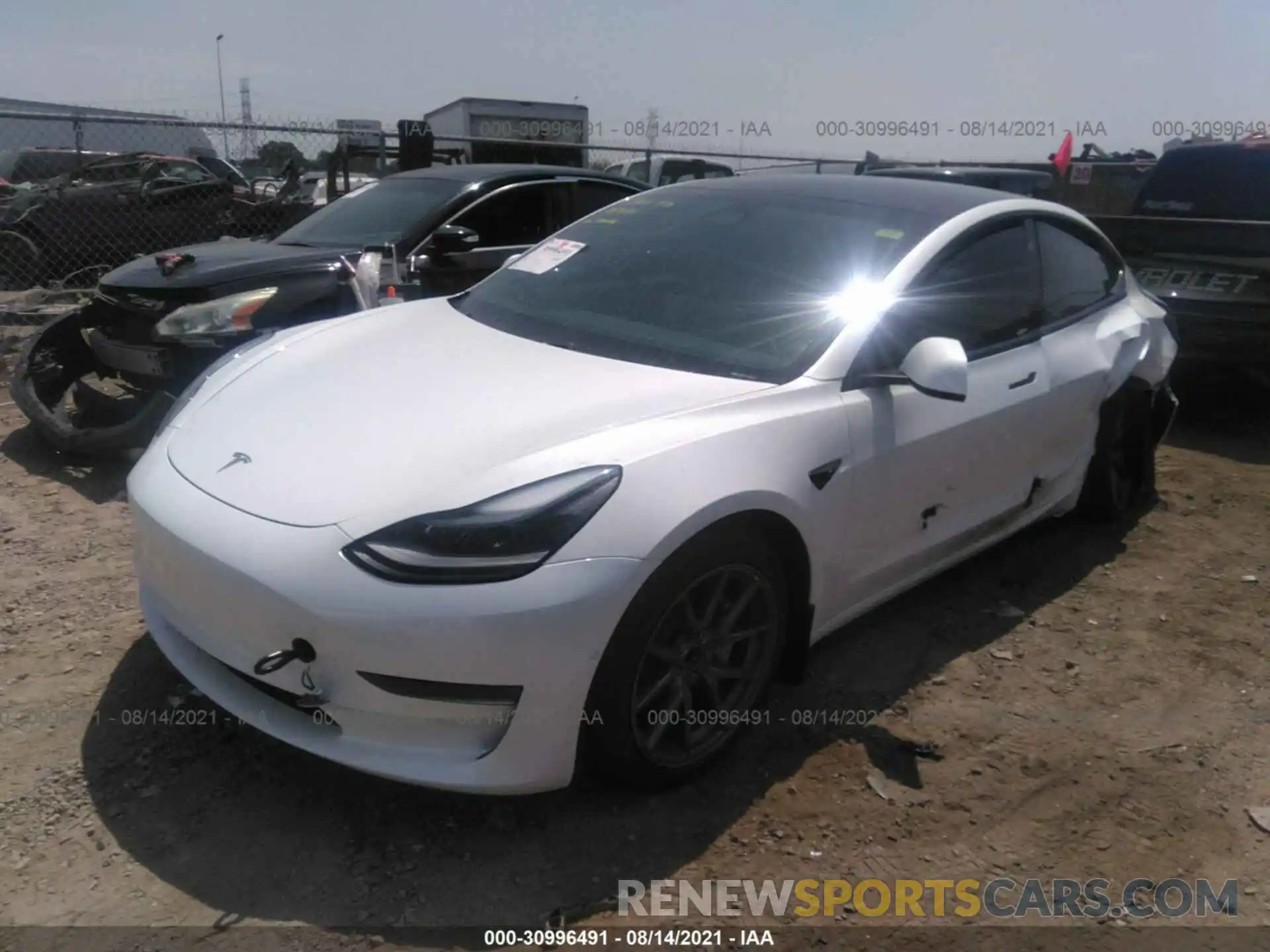 2 Photograph of a damaged car 5YJ3E1EA9MF943212 TESLA MODEL 3 2021