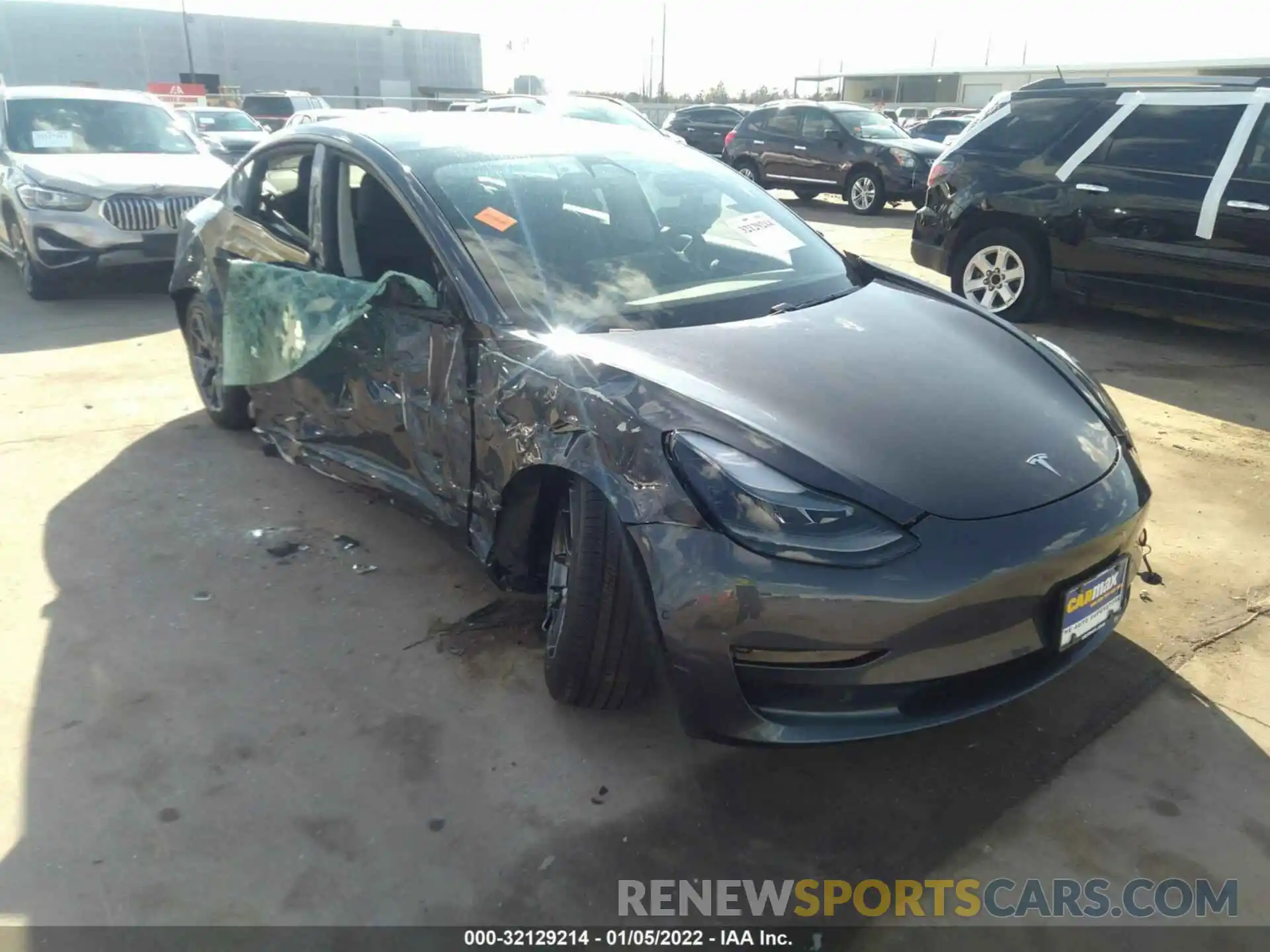 1 Photograph of a damaged car 5YJ3E1EA9MF977053 TESLA MODEL 3 2021