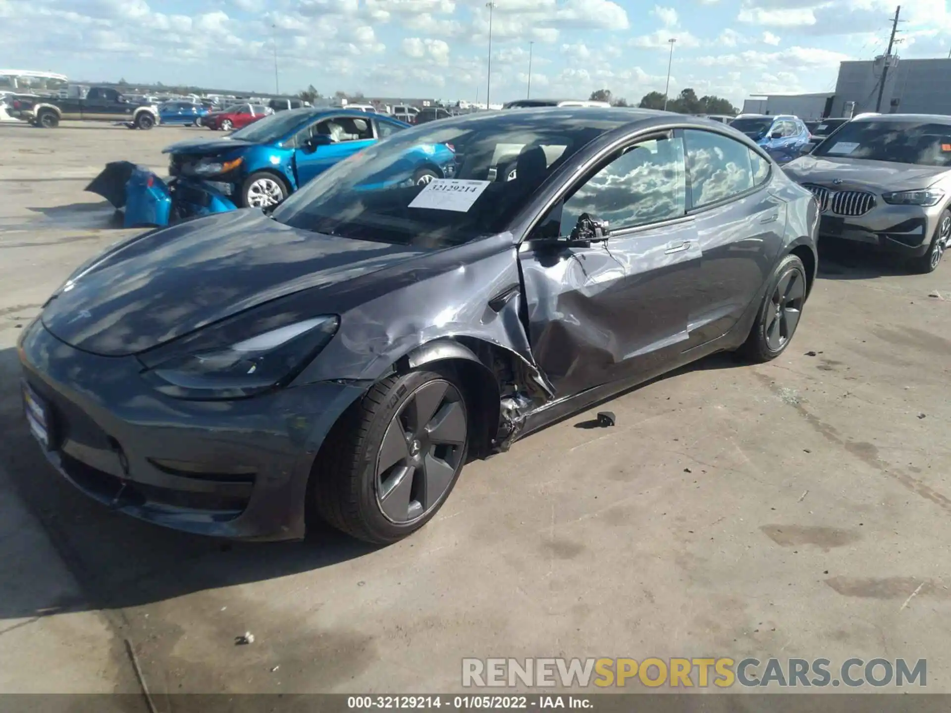 2 Photograph of a damaged car 5YJ3E1EA9MF977053 TESLA MODEL 3 2021