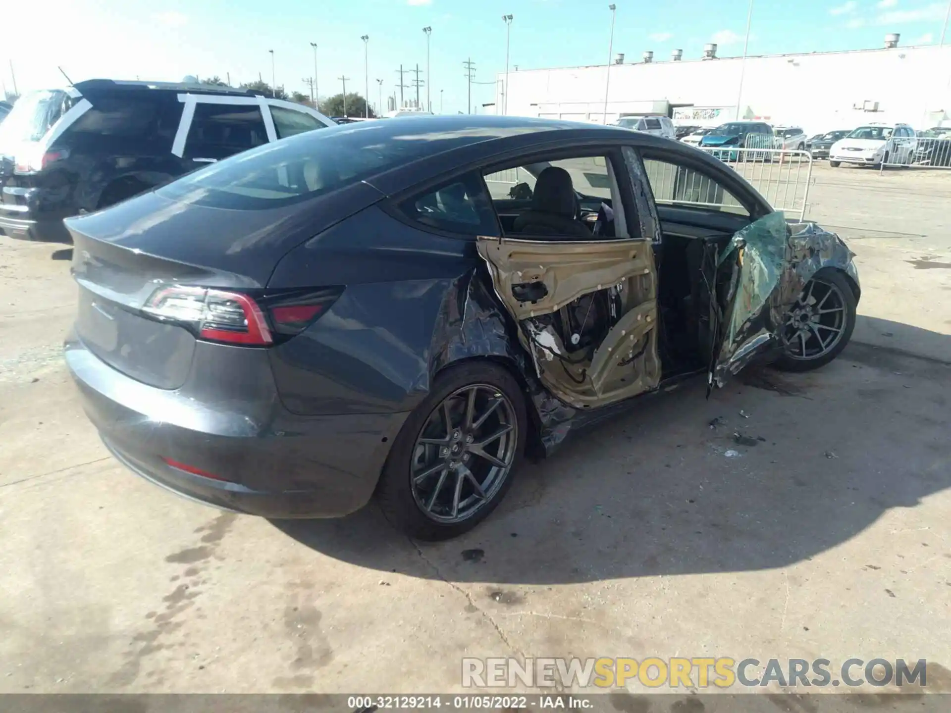 4 Photograph of a damaged car 5YJ3E1EA9MF977053 TESLA MODEL 3 2021