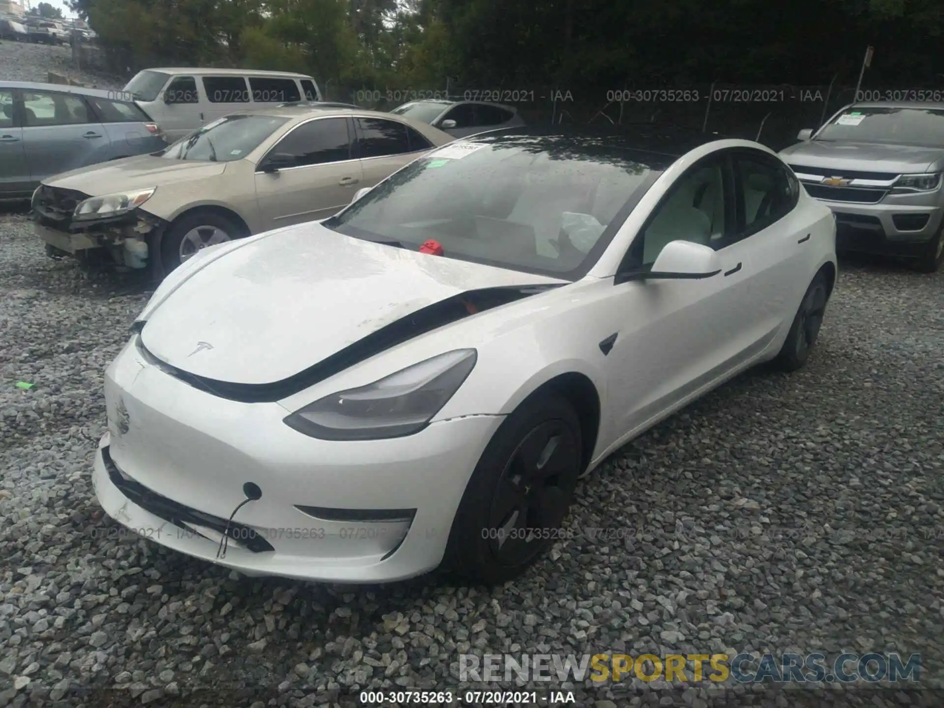 2 Photograph of a damaged car 5YJ3E1EA9MF987615 TESLA MODEL 3 2021