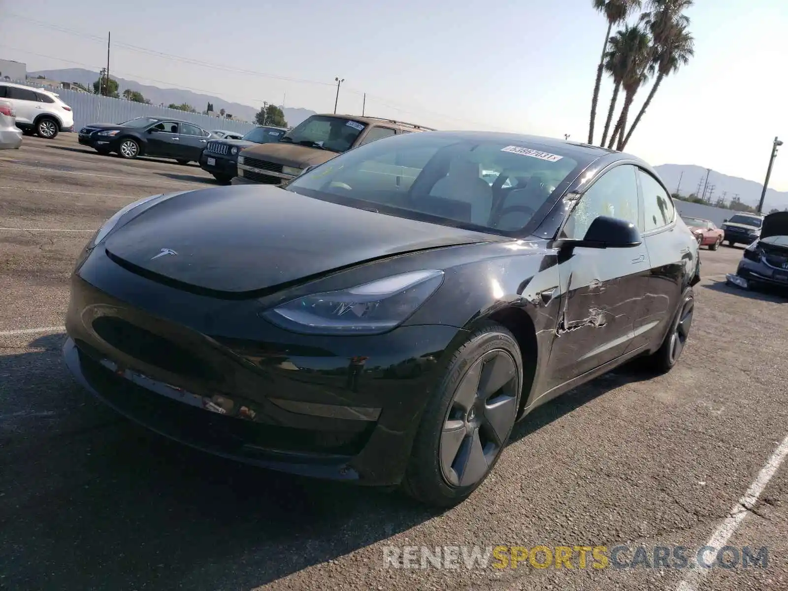 2 Photograph of a damaged car 5YJ3E1EA9MF994189 TESLA MODEL 3 2021