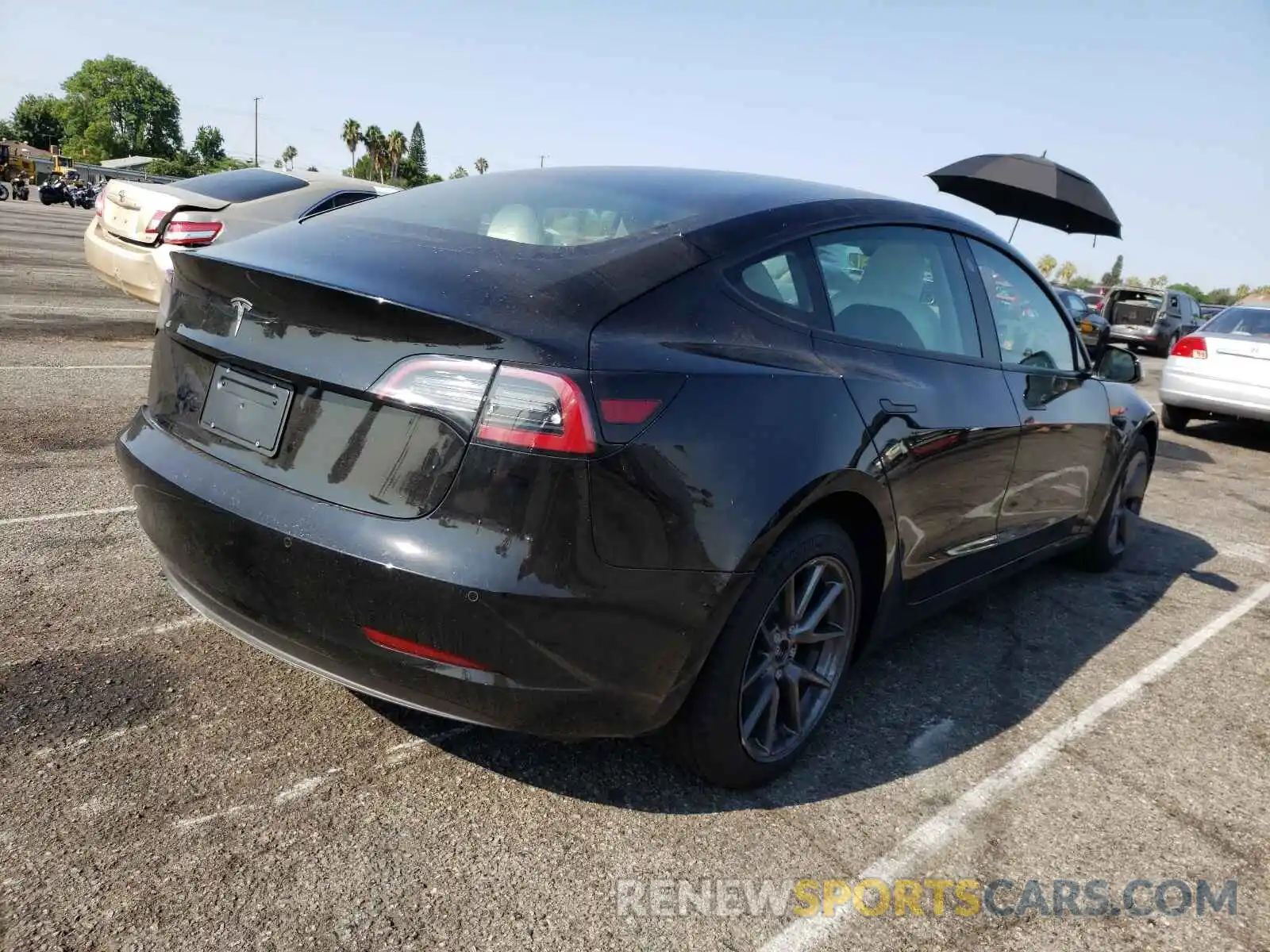 4 Photograph of a damaged car 5YJ3E1EA9MF994189 TESLA MODEL 3 2021